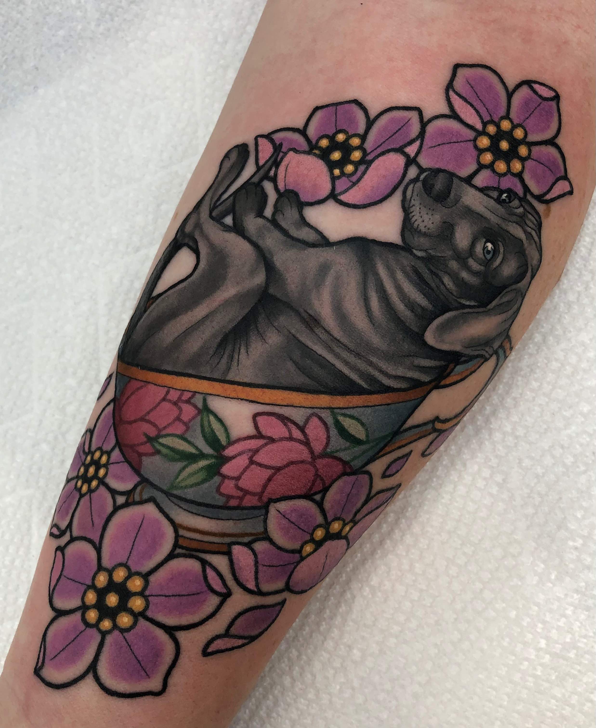 Neo traditional puppy in teacup with flowers tattoo in color portfolio work by Keith Kuzara at Sink or Swim Tattoo and Piercing in Niagara Falls NY