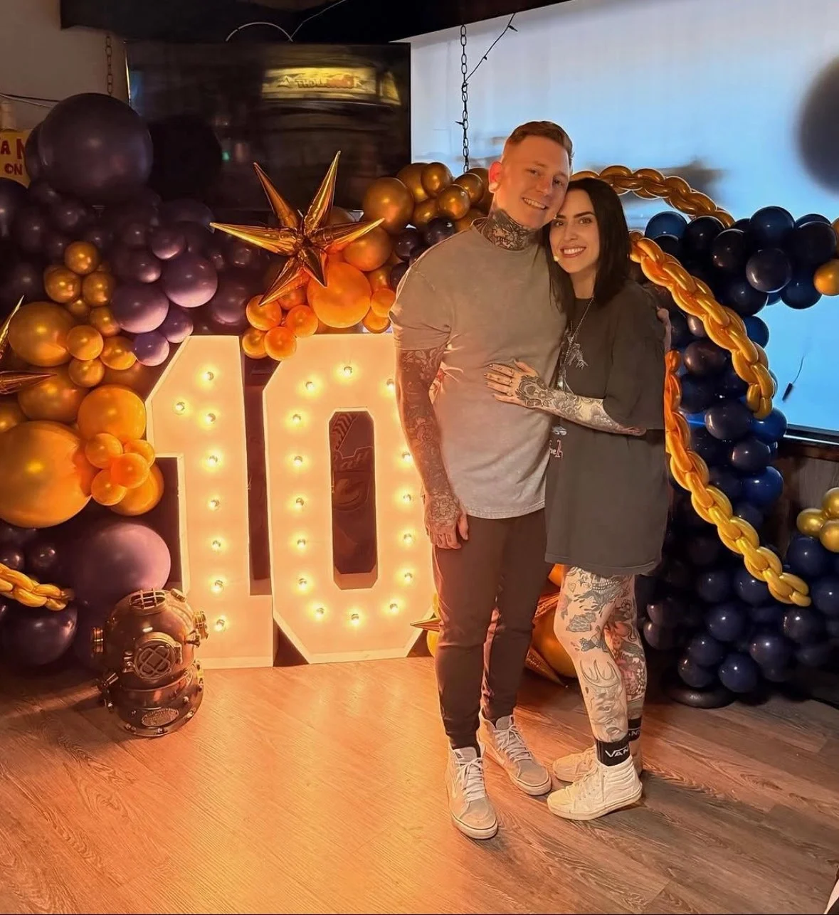 Keith and shannon celebrating ten years of owning sink or swim in Niagara Falls ny