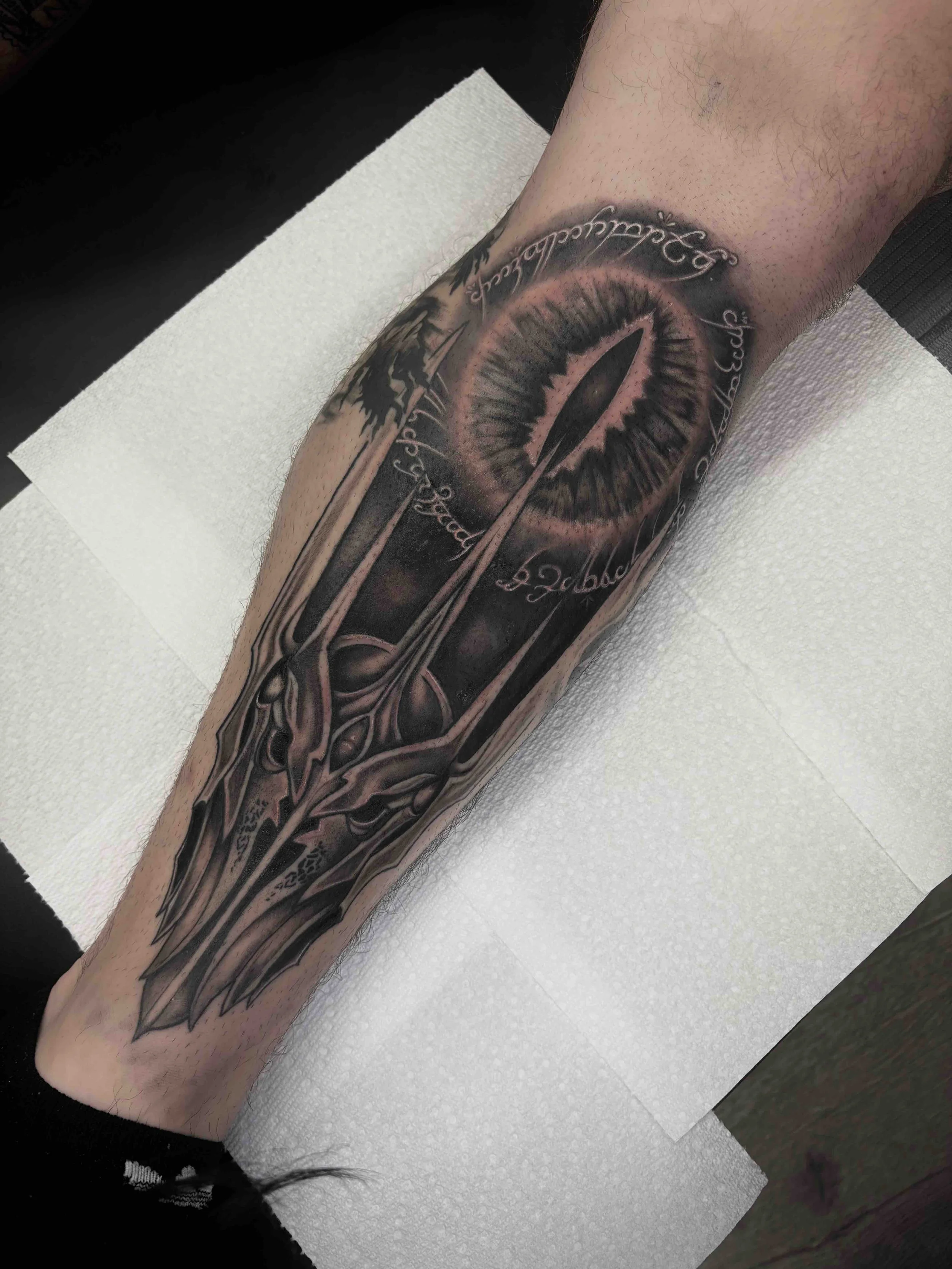 lord of the rings, black and grey tattoo on calf , portfolio work by Brooke Canzoneri at sink or swim tattoo and piercing in Niagara Falls, ny