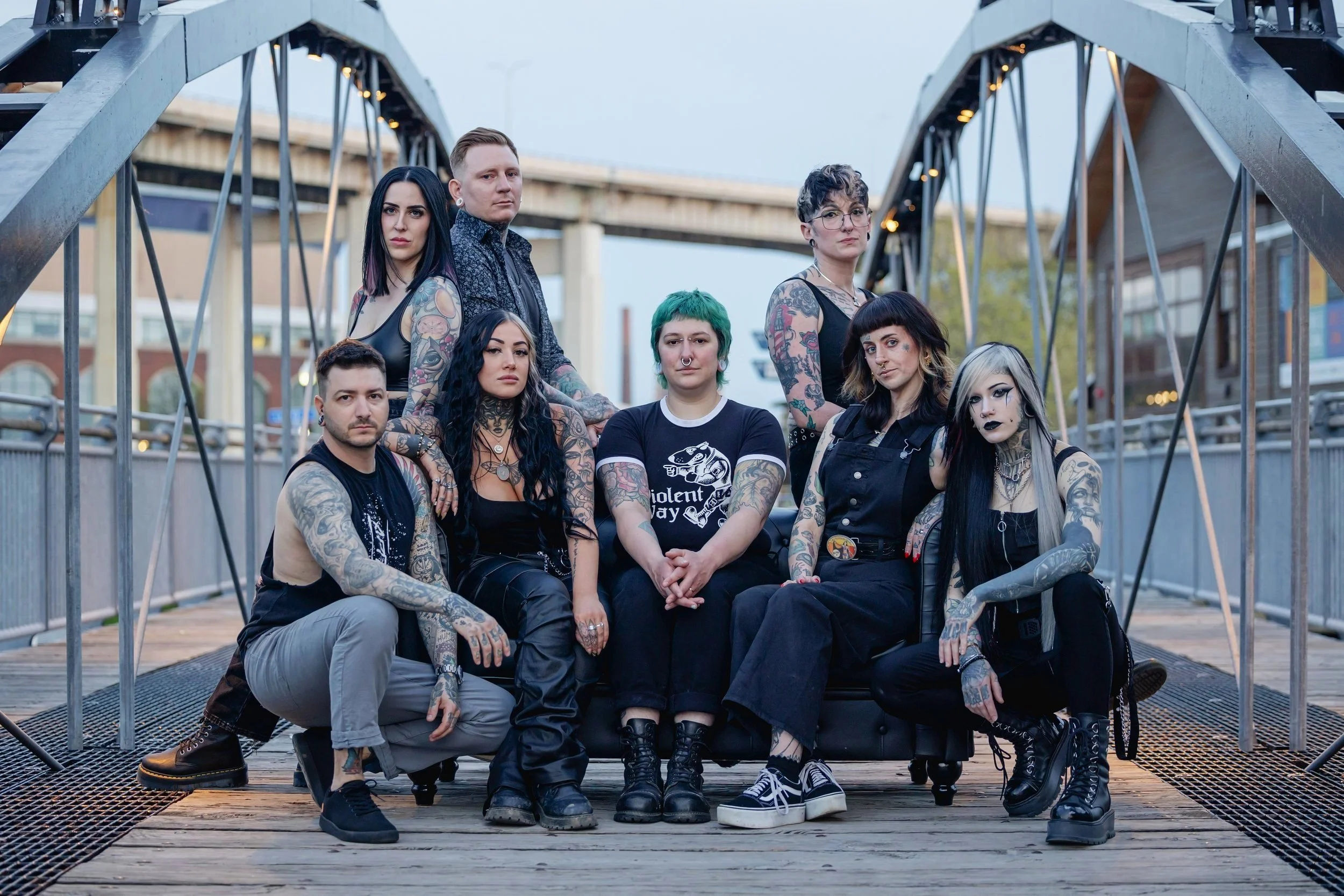 Professional photo of the full tattoo artist and body piercing team at Sink or Swim Tattoo and piercing in the Buffalo-Niagara region