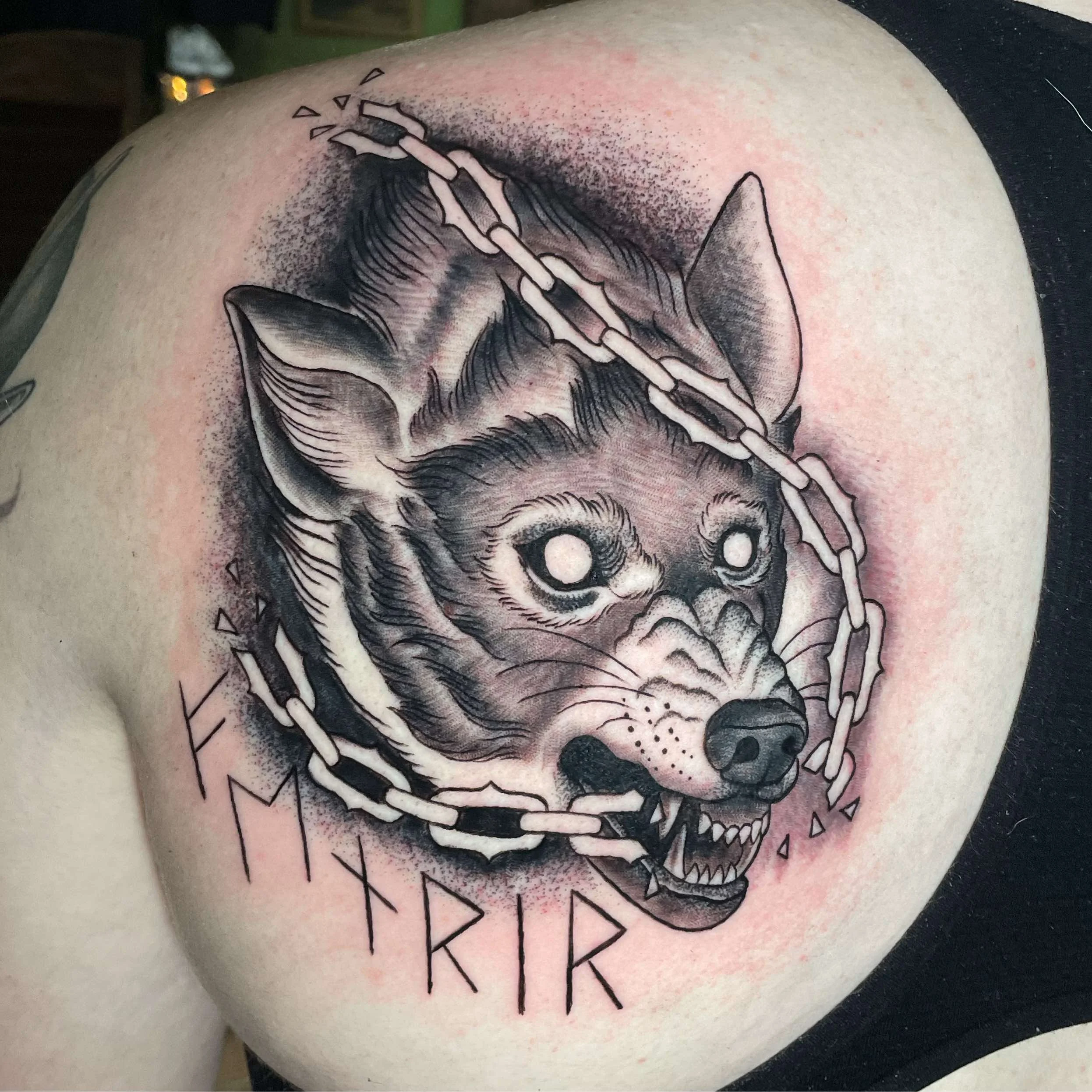 Black and grey illustrative wolf tattoo, portfolio work by Emily Quartley at Sink or Swim Tattoo and Piercing in Niagara Falls, NY