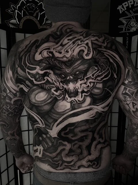 large balrog in black and grey on a back, portfolio work by Jordy Levea at sink or swim tattoo and piercing in Niagara Falls, ny