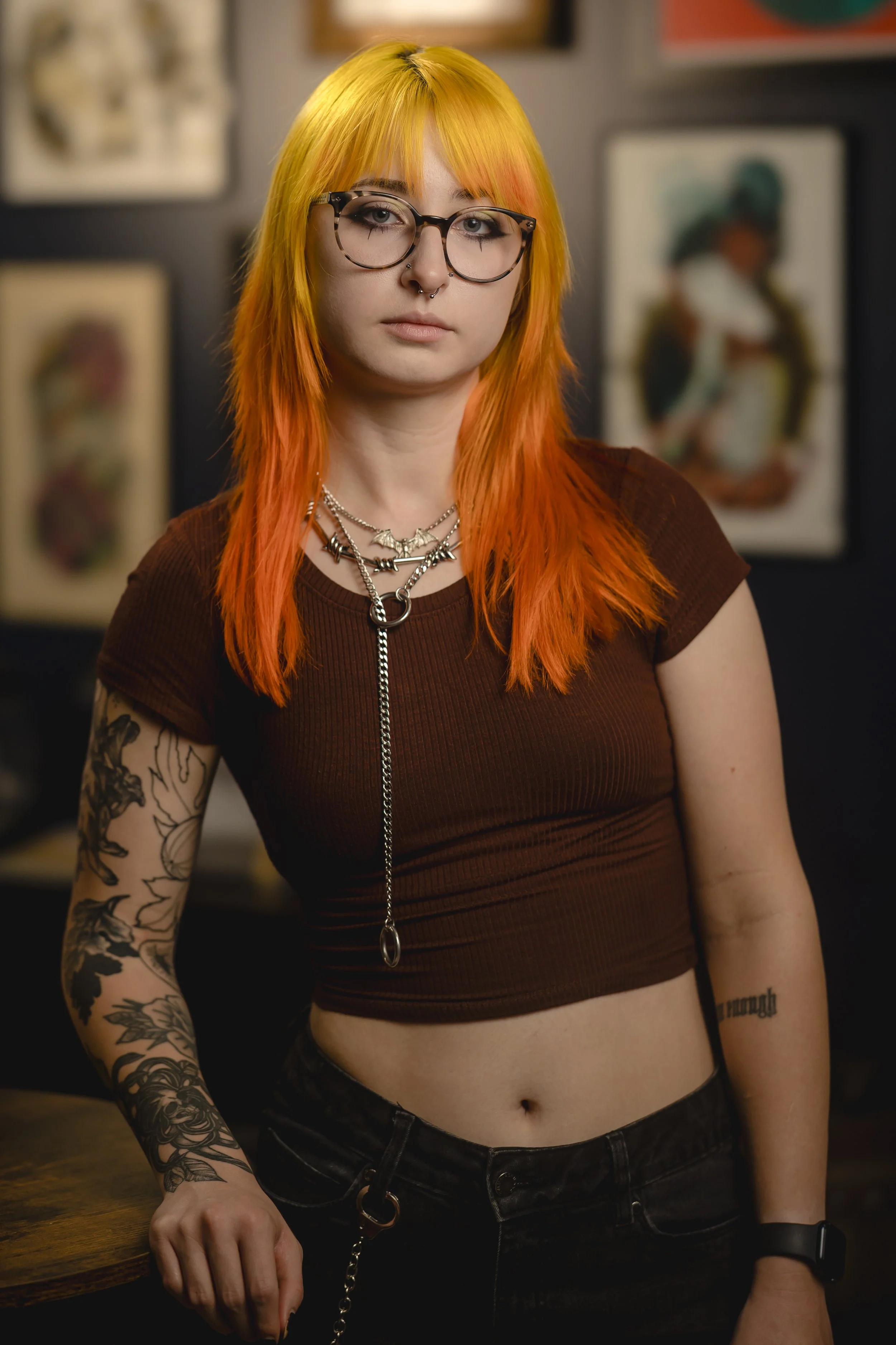 Studio headshot portrait of a resident tattoo and body piercing apprentice on the crew team at Sink or Swim Tattoo and Piercing