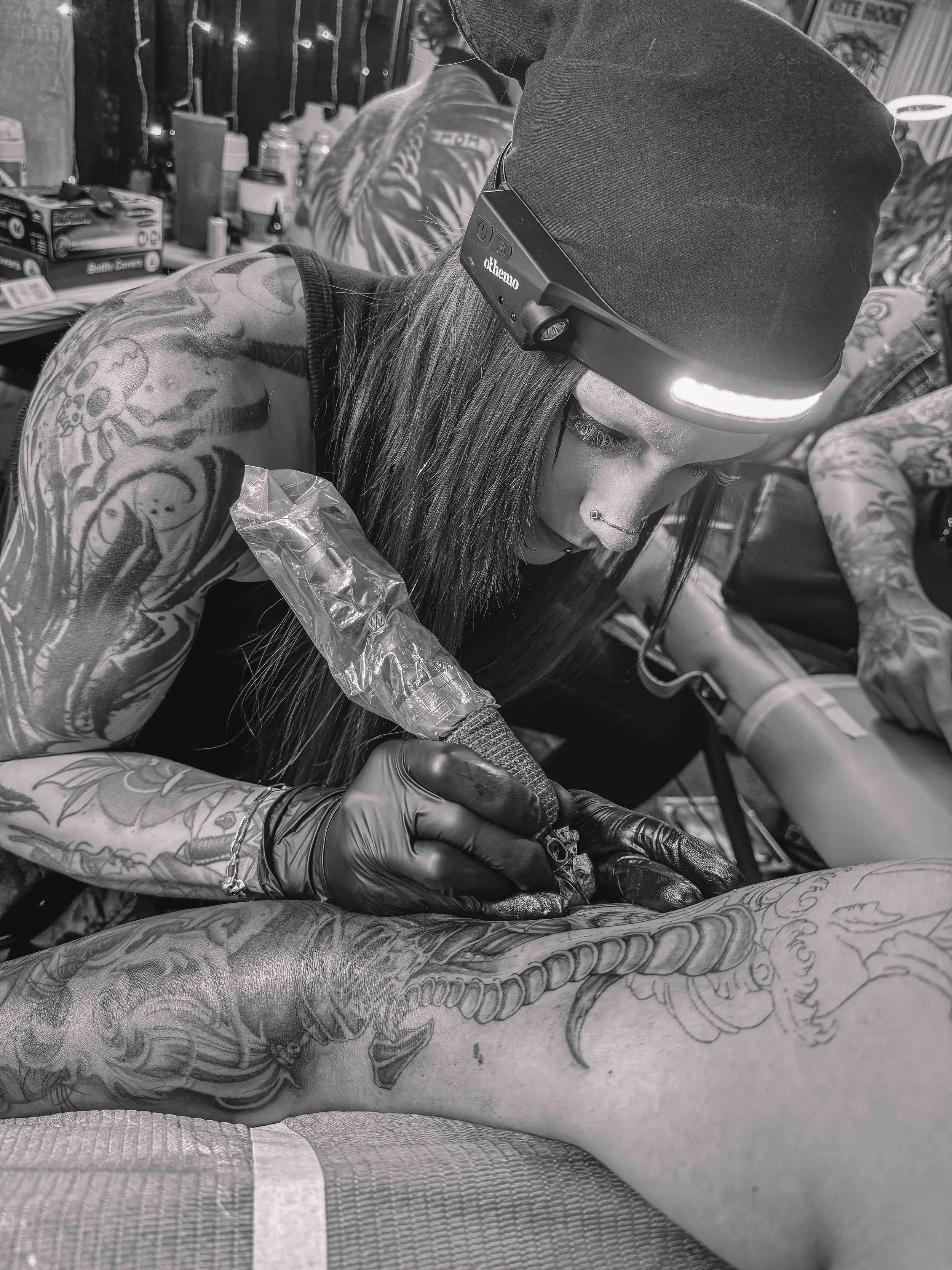 Jordy tattooing at a convention in Niagara Falls, ny
