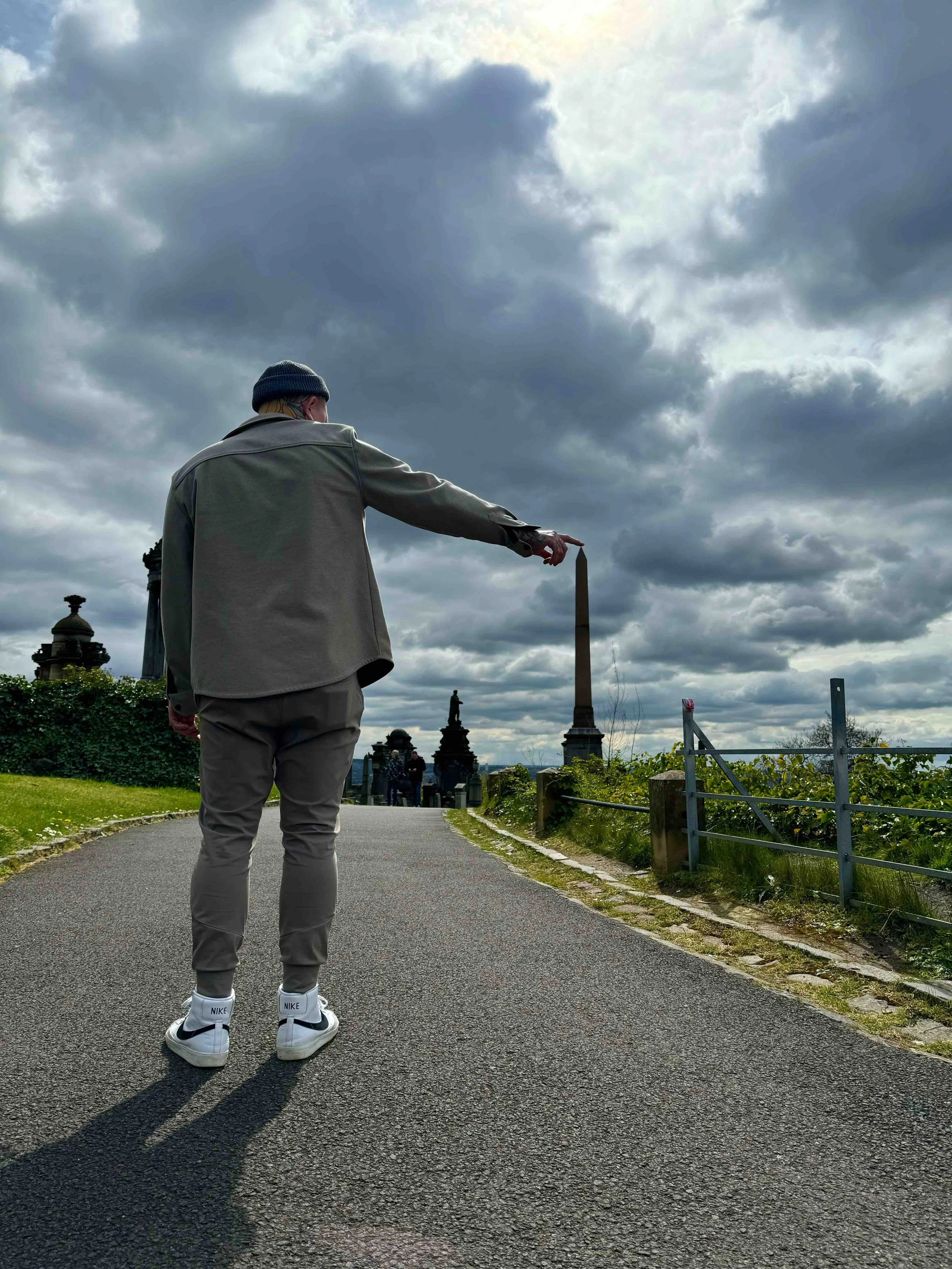 Keith posing at a cemetery outside of Dublin, Ireland