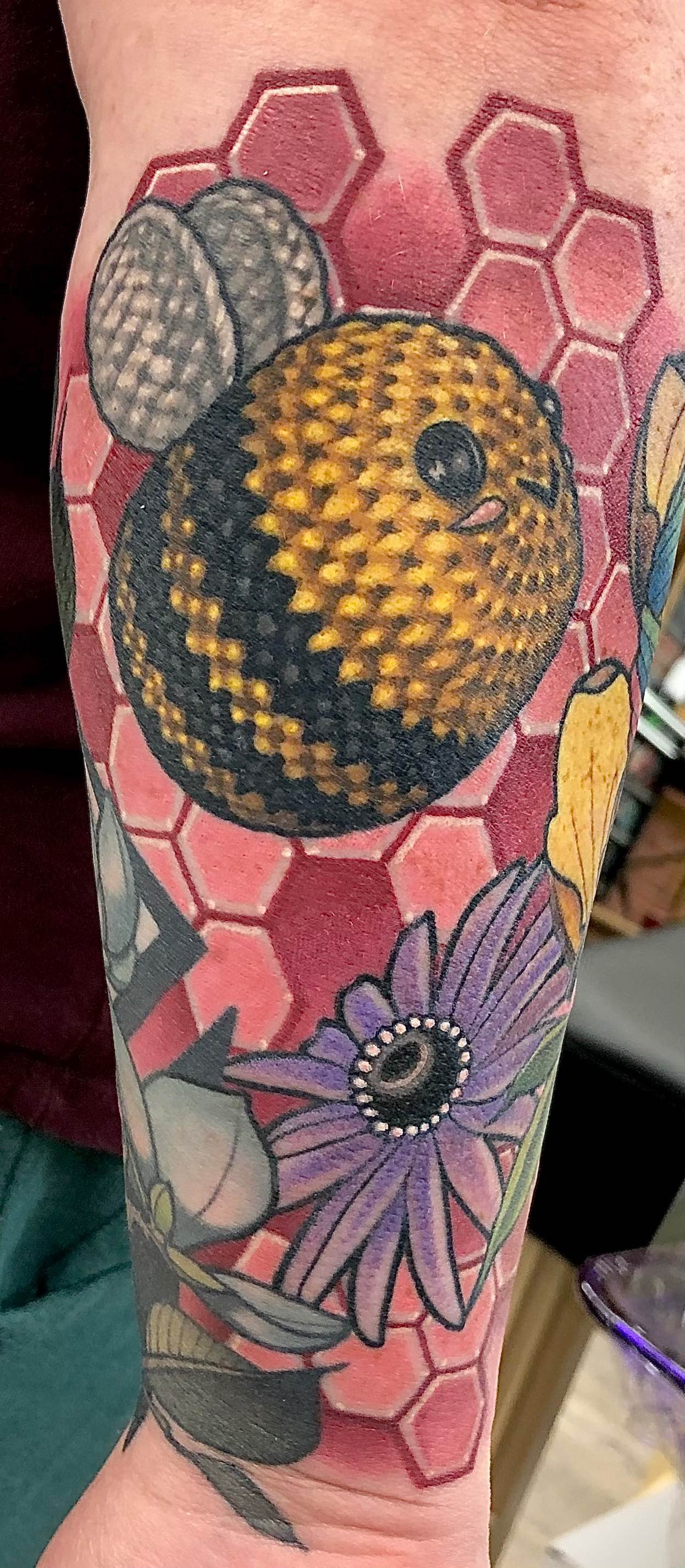 Realistic crochet bumble bee tattoo in color portfolio work by Keith Kuzara at Sink or Swim Tattoo and Piercing in Niagara Falls NY