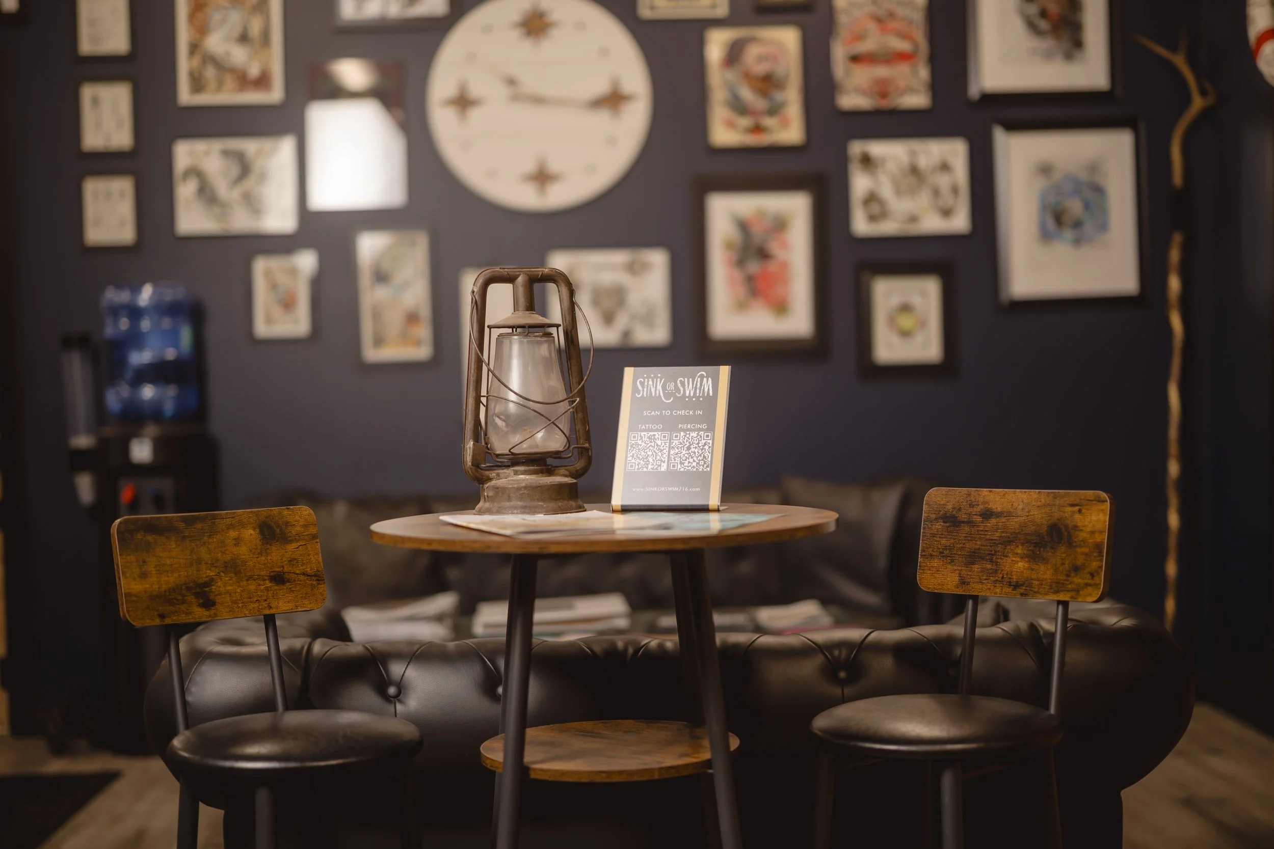 The touchless digital check-in station with QR codes for tattoo and piercing clients at Sink or Swim Tattoo and piercing in the Buffalo-Niagara region