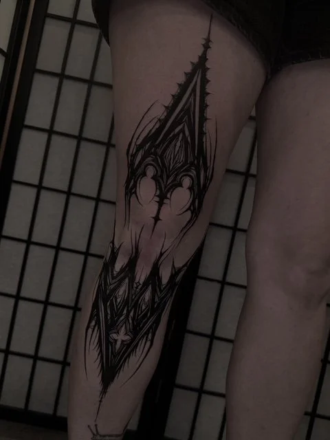 dark ornamental cathedral blackwork leg tattoo , portfolio work by Jordy Levea at sink or swim tattoo and piercing in Niagara Falls, ny