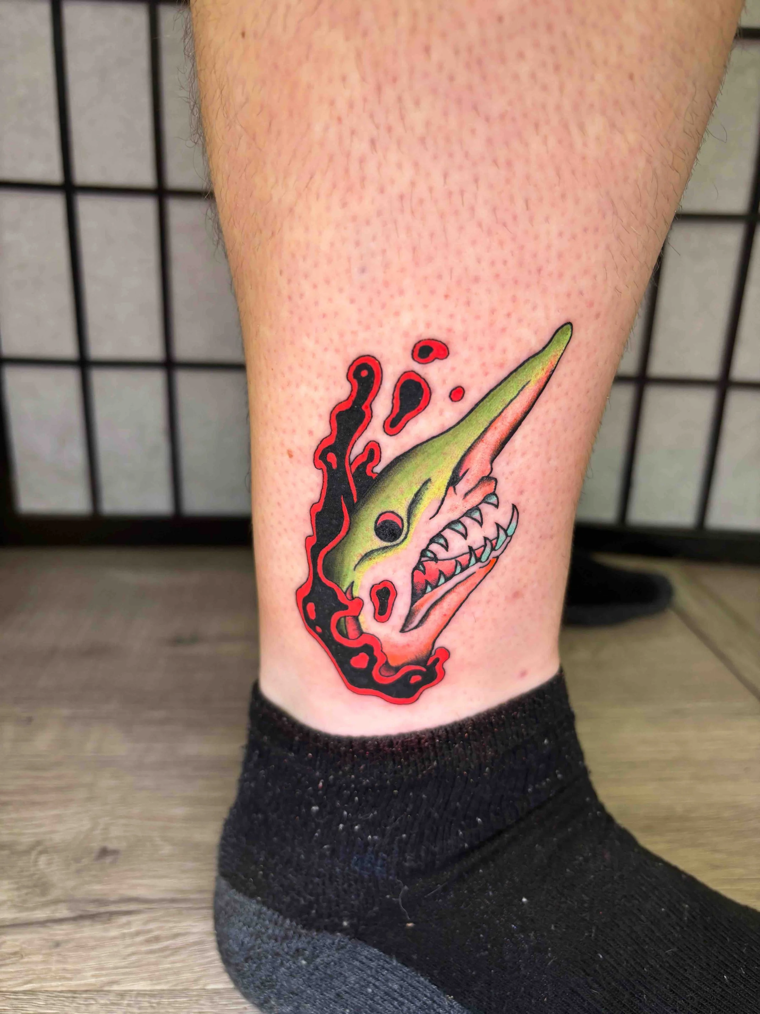 Neo traditional goblin shark in color above the ankle by AK Zaionz at Sink or Swim in Niagara Falls NY