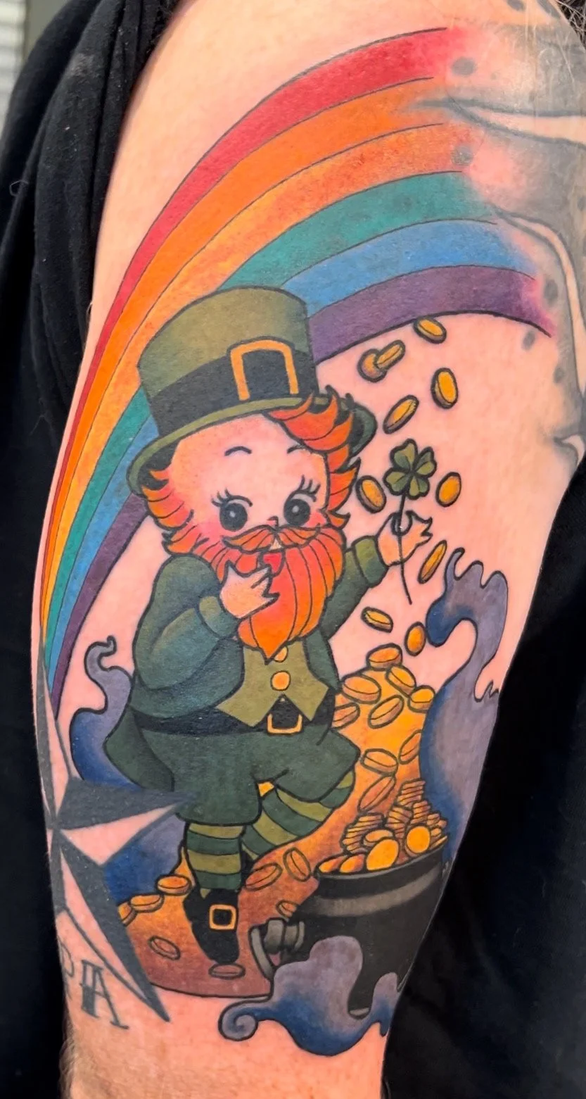 kewpie leprechaun with bold colors, portfolio work by Samantha Sullivan at Sink or Swim Tattoo and Piercing in Niagara Falls, NY 