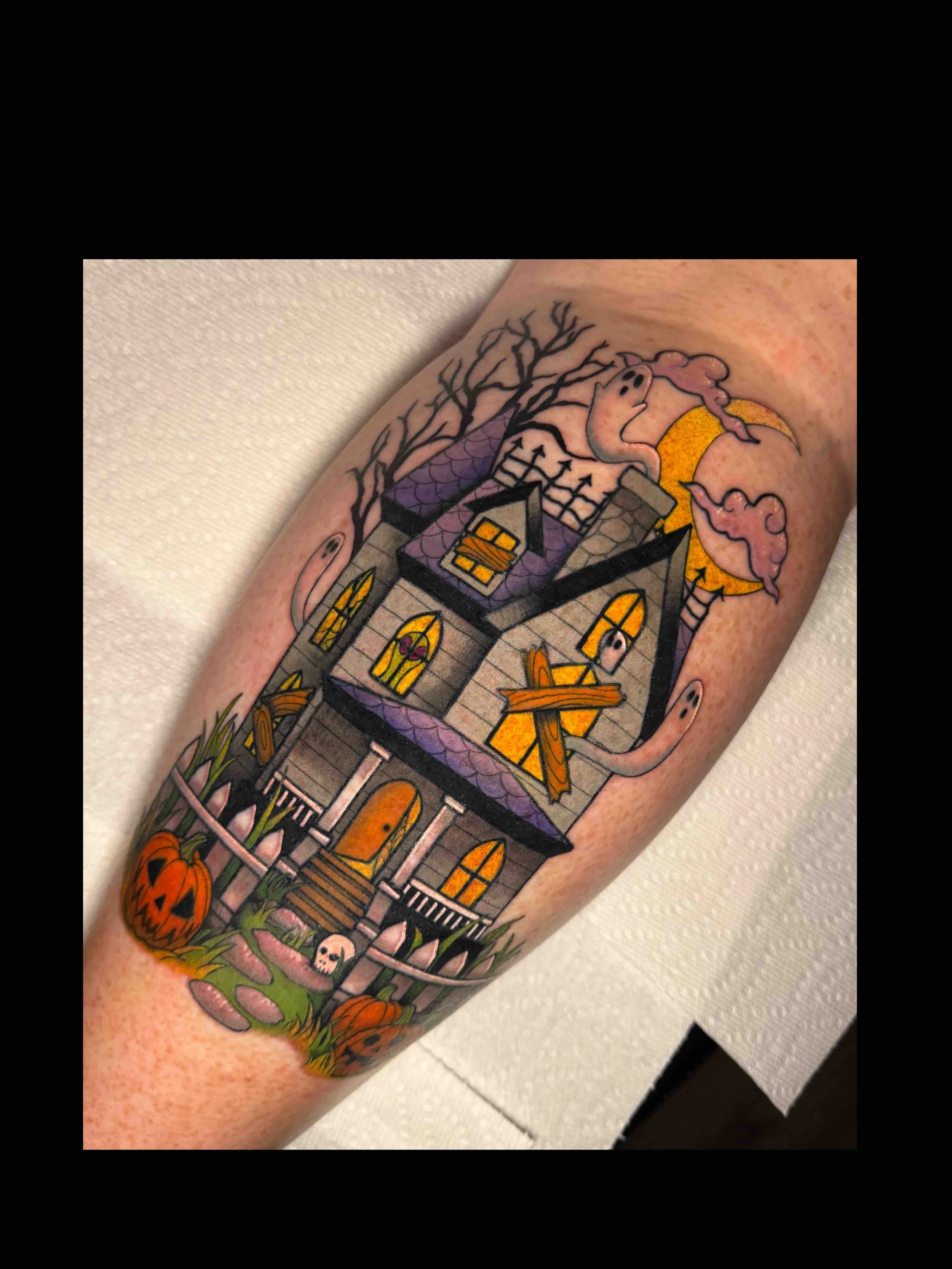 Neo traditional spooky haunted house halloween tattoo in color portfolio work by Shannon Kuzara at Sink or Swim Tattoo and Piercing in Niagara Falls NY