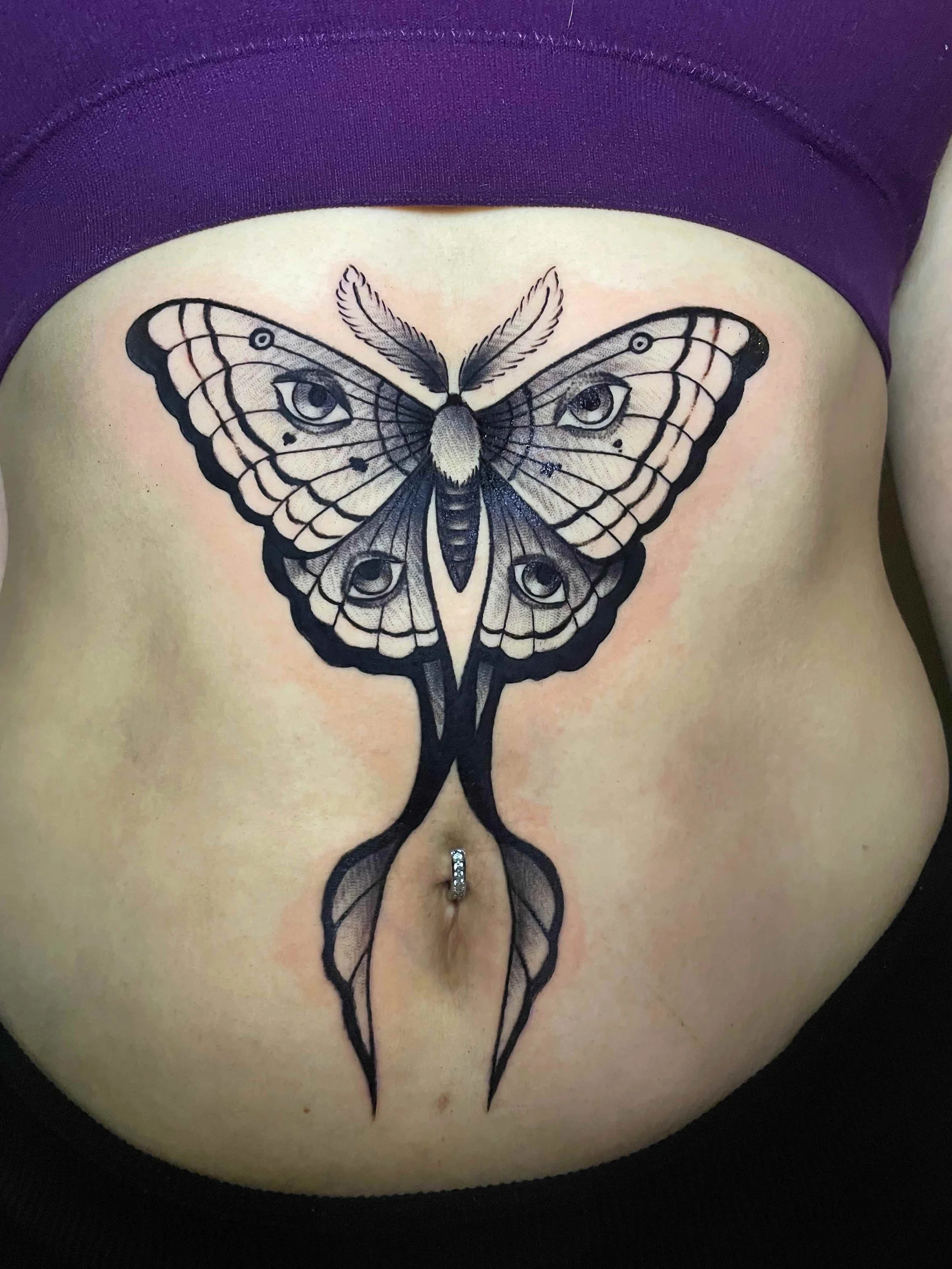 Black and grey linework of a luna moth tattoo, portfolio work by Emily Quartley at Sink or Swim Tattoo and Piercing in Niagara Falls, NY