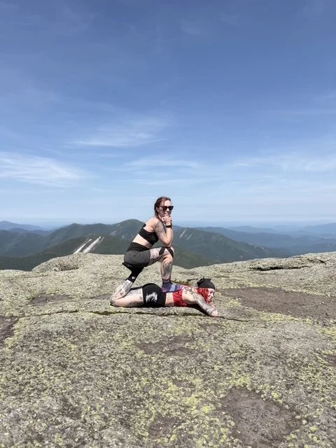 Jordy and her friend posing at a summit