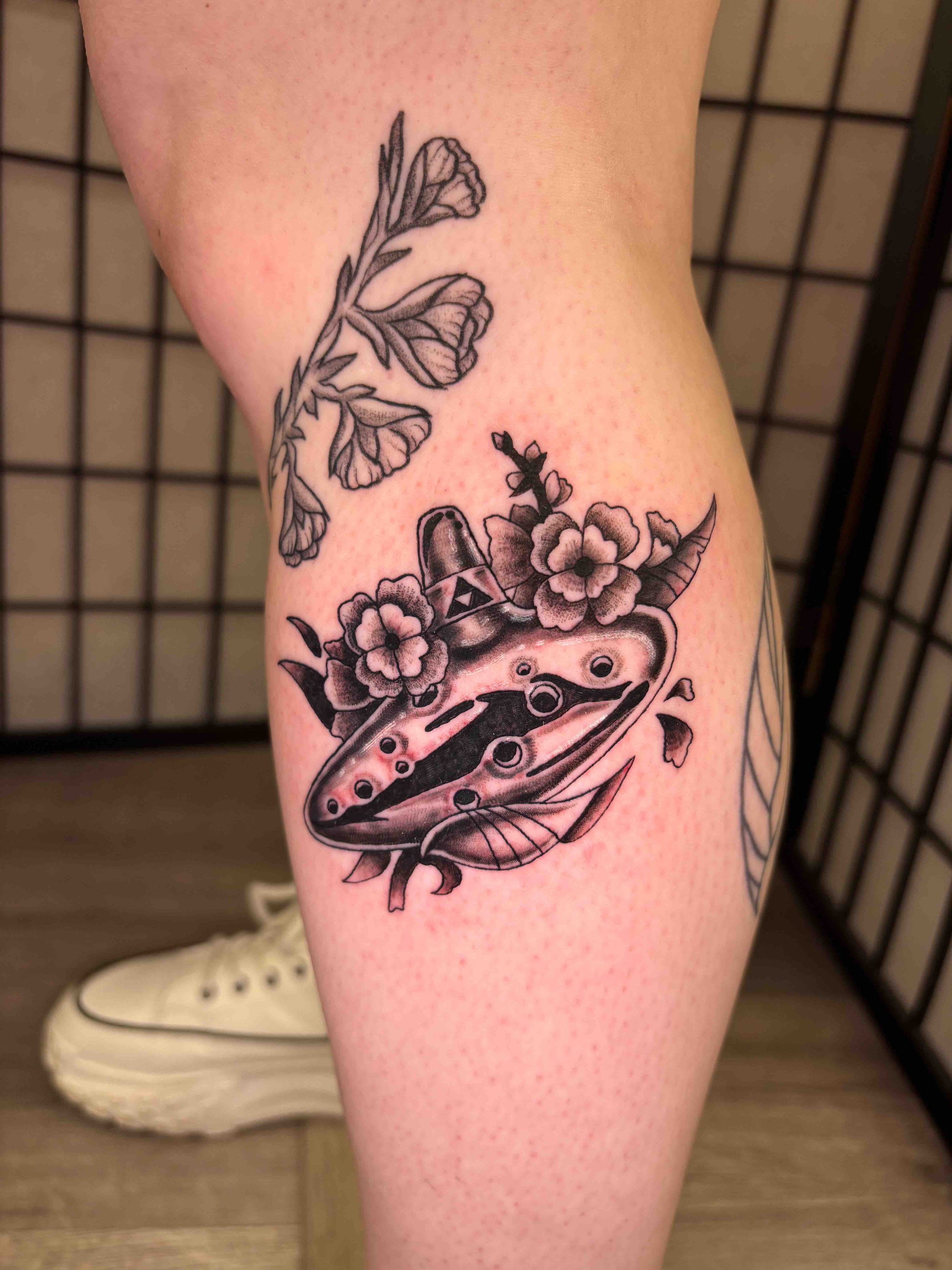 Black and grey ocarina tattoo from the Legend of Zelda, portfolio work by AK Zaionz at Sink or Swim in Niagara Falls NY