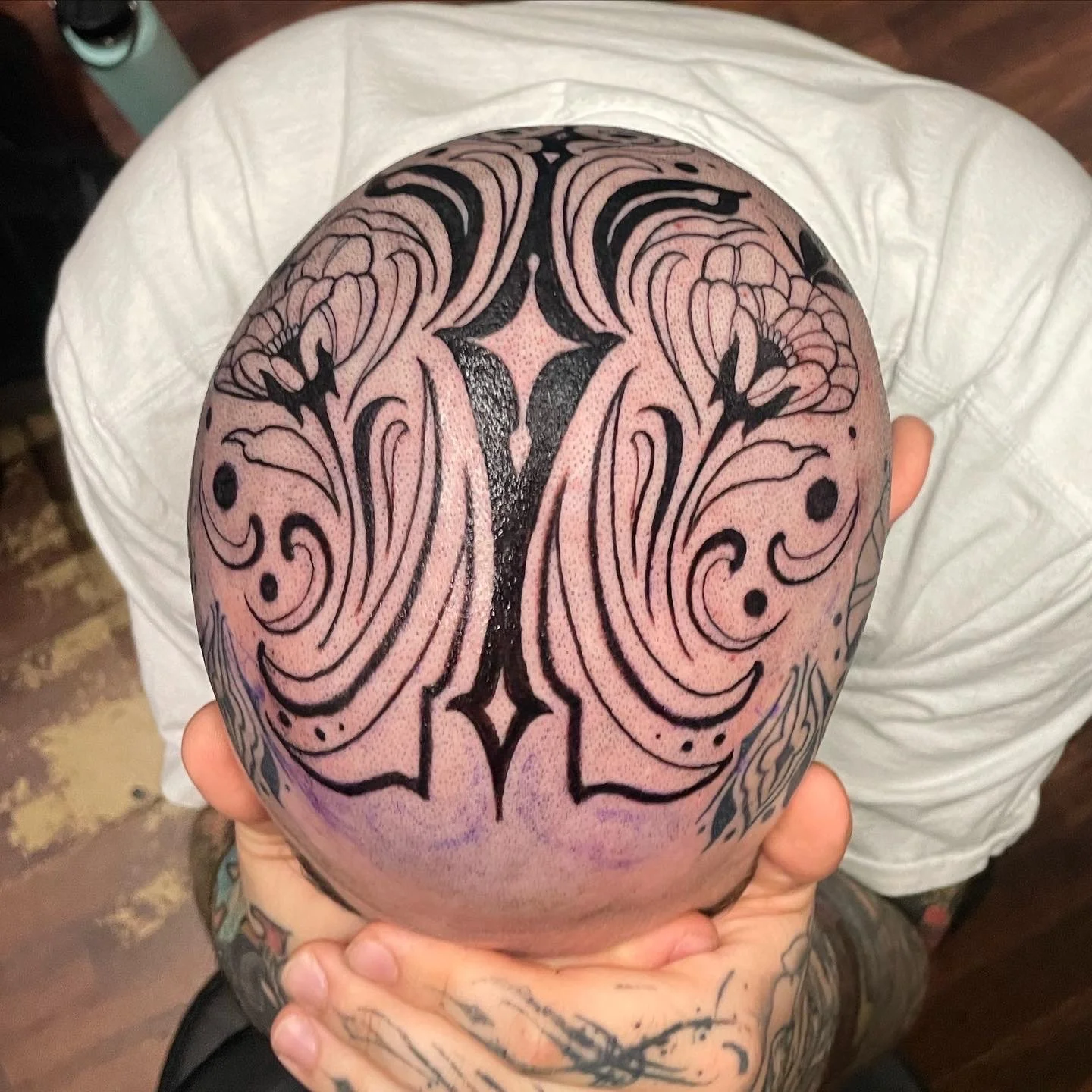 Black and grey illustrative tribal head tattoo, portfolio work by Emily Quartley at Sink or Swim Tattoo and Piercing in Niagara Falls, NY