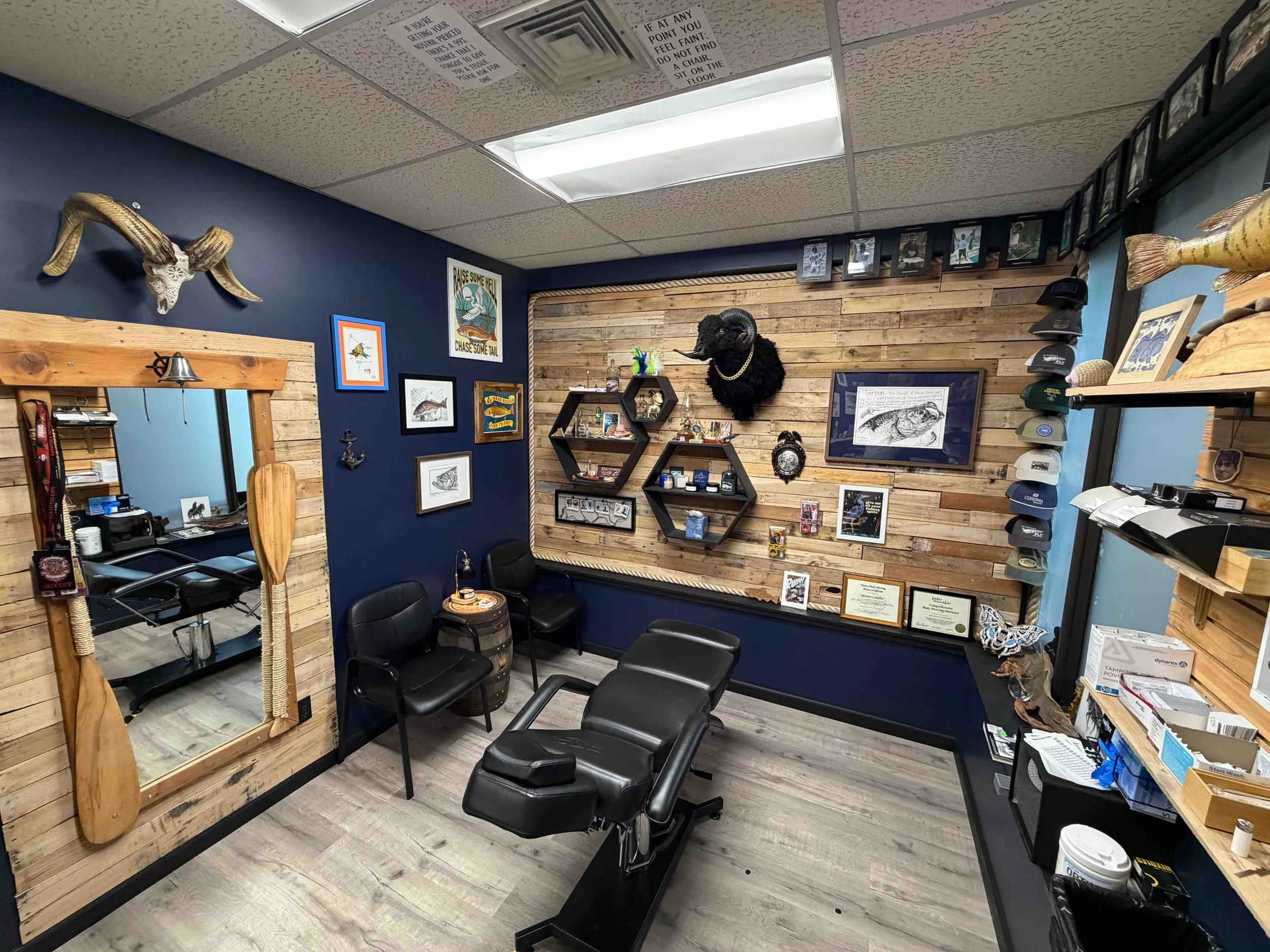 Clean, professional piercing room featuring a sterilization/autoclave station at Sink or Swim Tattoo and Piercing in Niagara Falls, NY