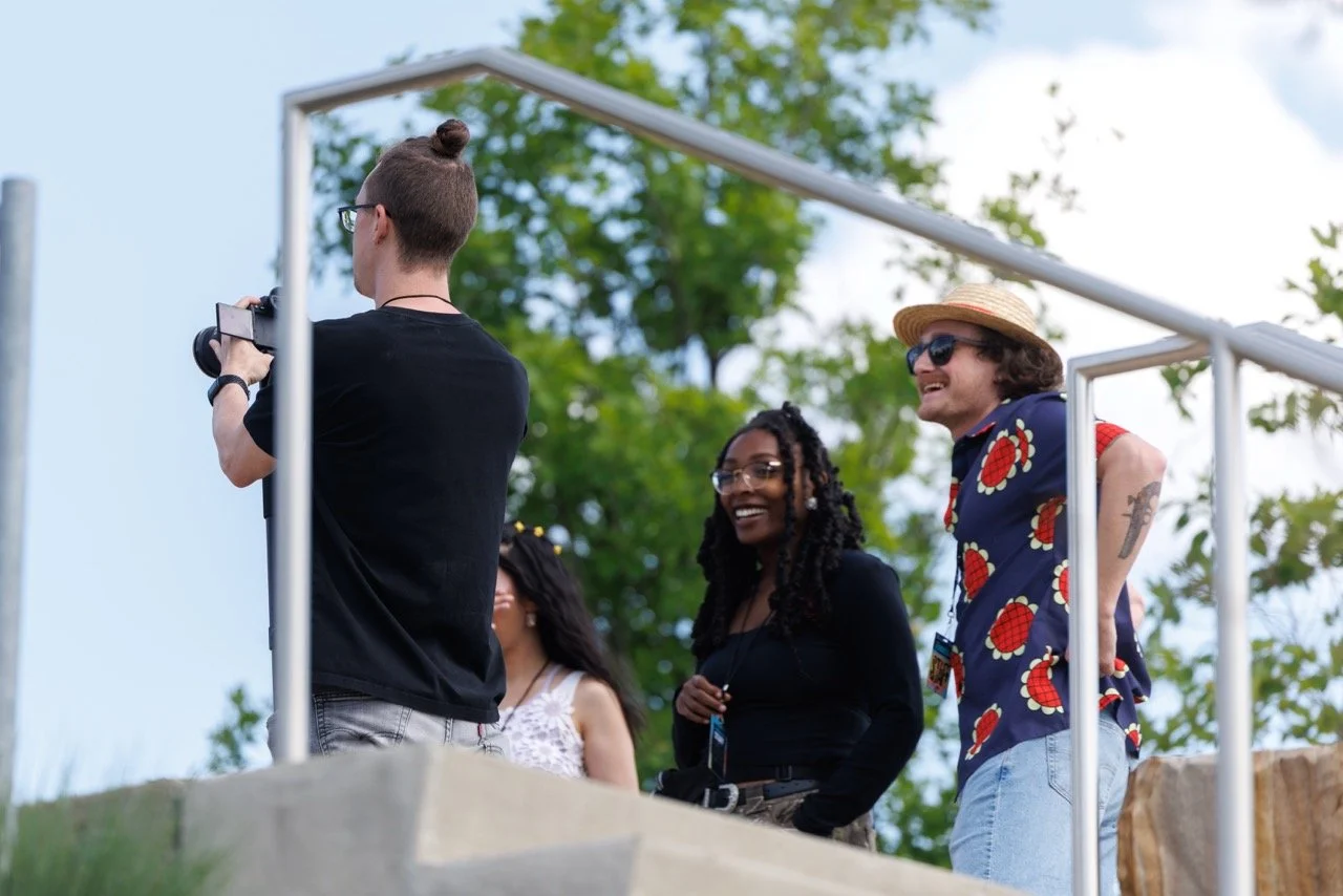 B-roll DP David Roseberry, producer Kennedy Hall, and Brannin Webber filming festival merchandise at RiverBeat Music Fest 2026 for Agency. Tom Lee Park, Memphis.