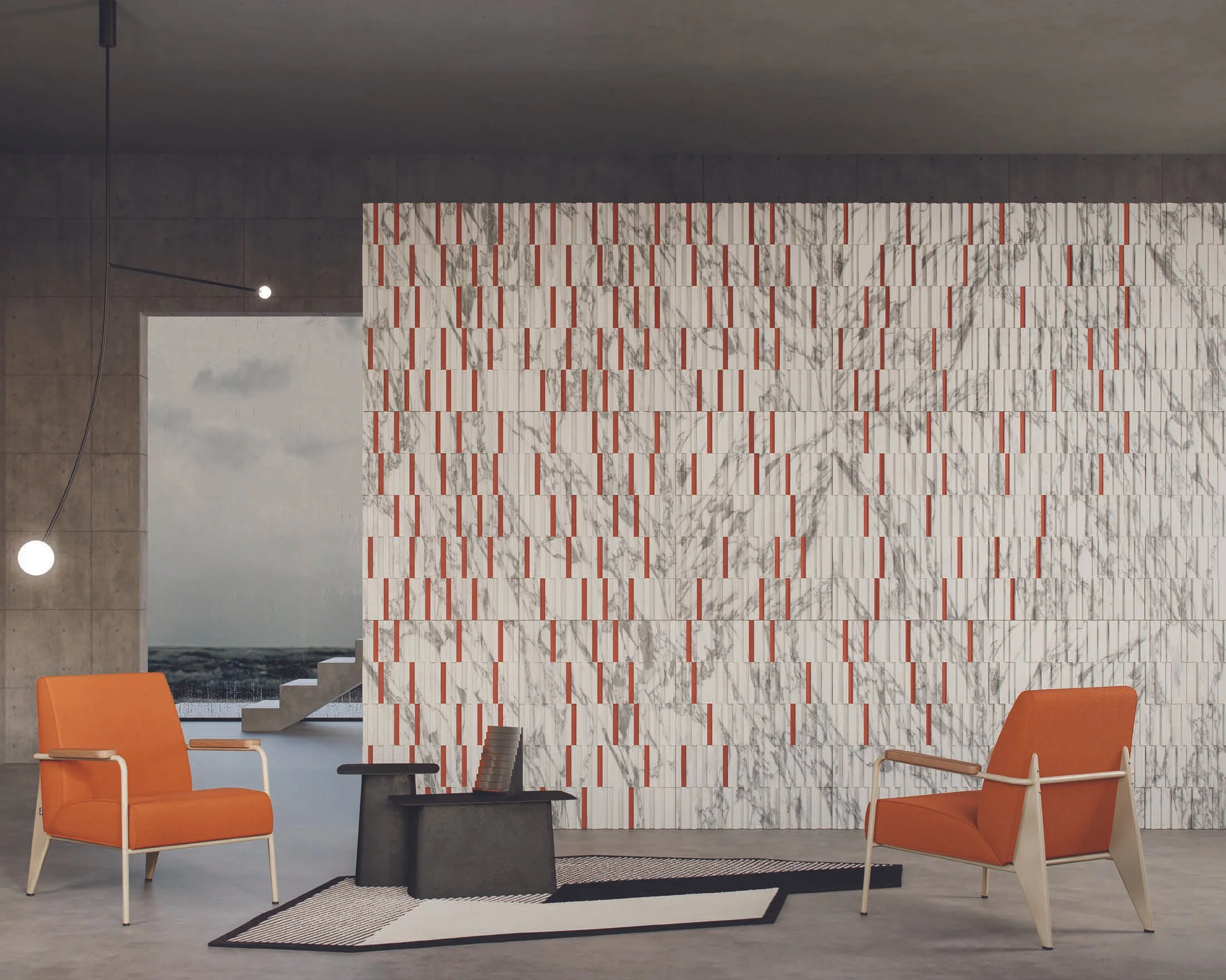Interno moderno con due poltrone arancioni, un tavolino di forma irregolare e una parete decorativa con mattonelle di marmo e dettagli rossi.