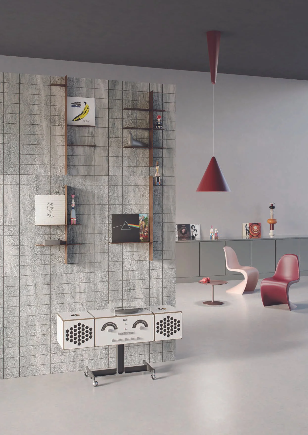 Interno moderno con parete di mattoni a vista decorata con mensole e quadri, due sedie di design, una bianca e una rosa, con tavolino, lampade pendenti rosse, e una consolle con oggetti decorativi.