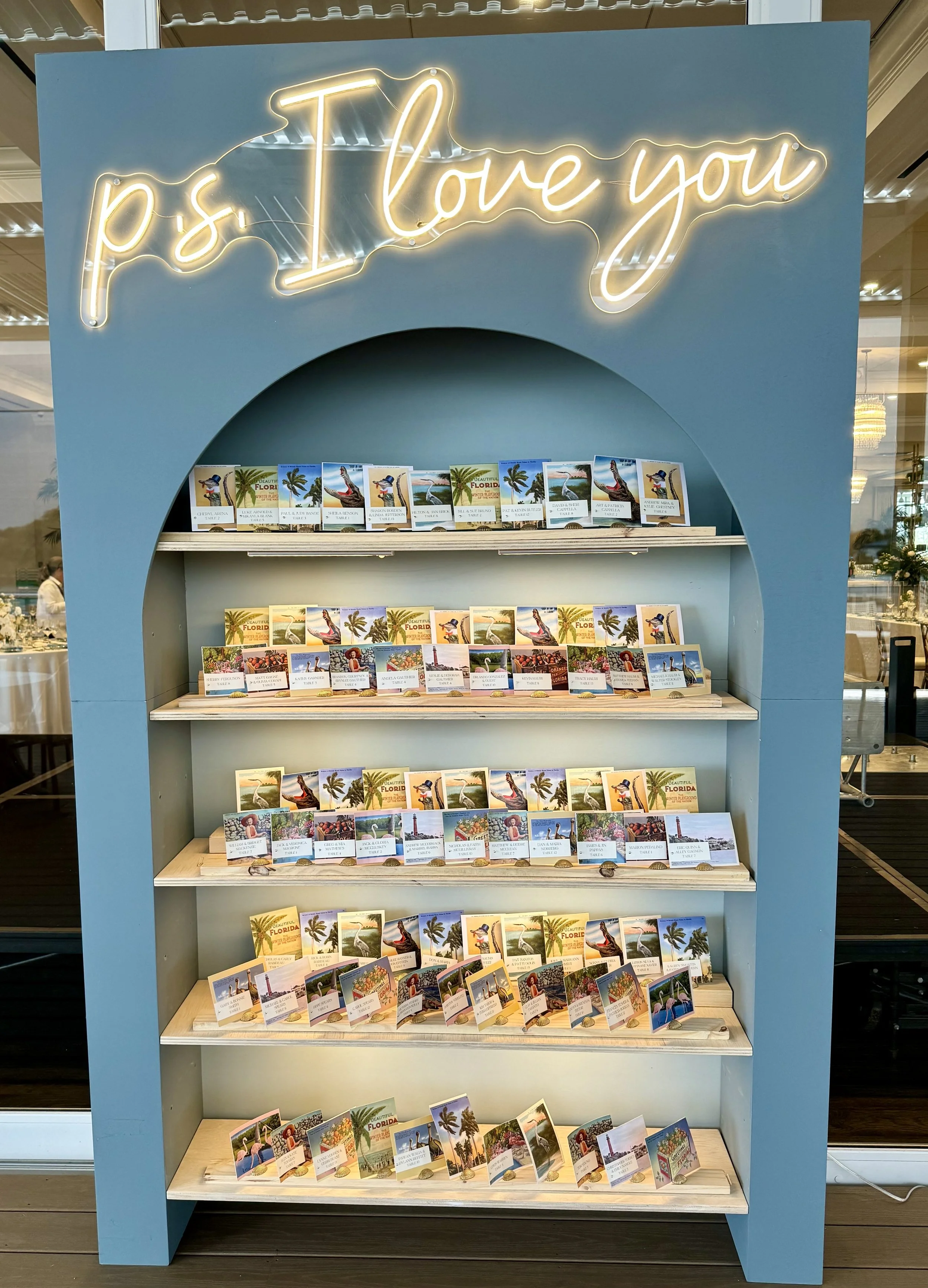 Guest activations including escort walls, party favors, guest books, place card tables, entrance way arches for parties and weddings.