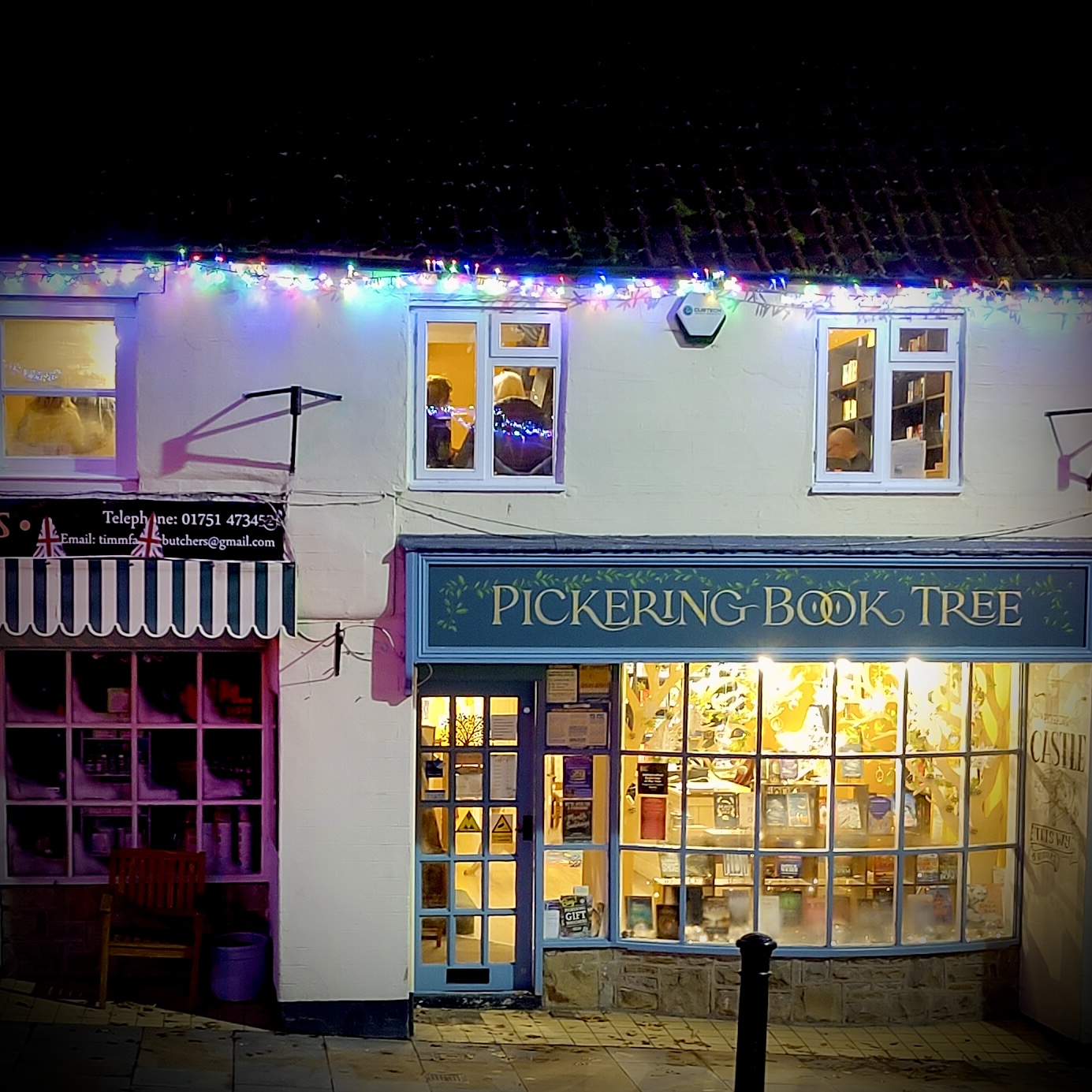 1. Front of shop gin and books evening.jpg.png