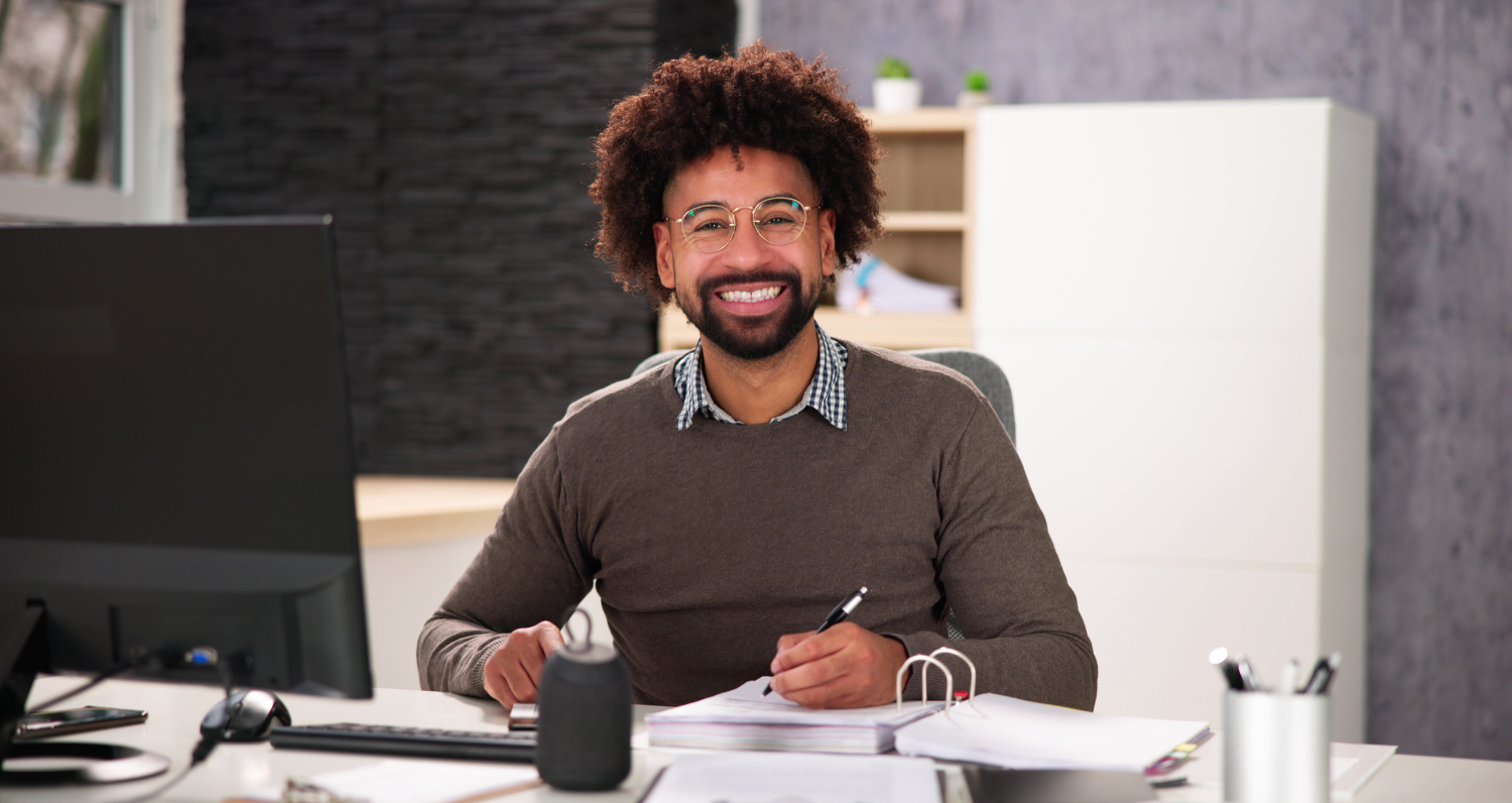 Man at office smiling
