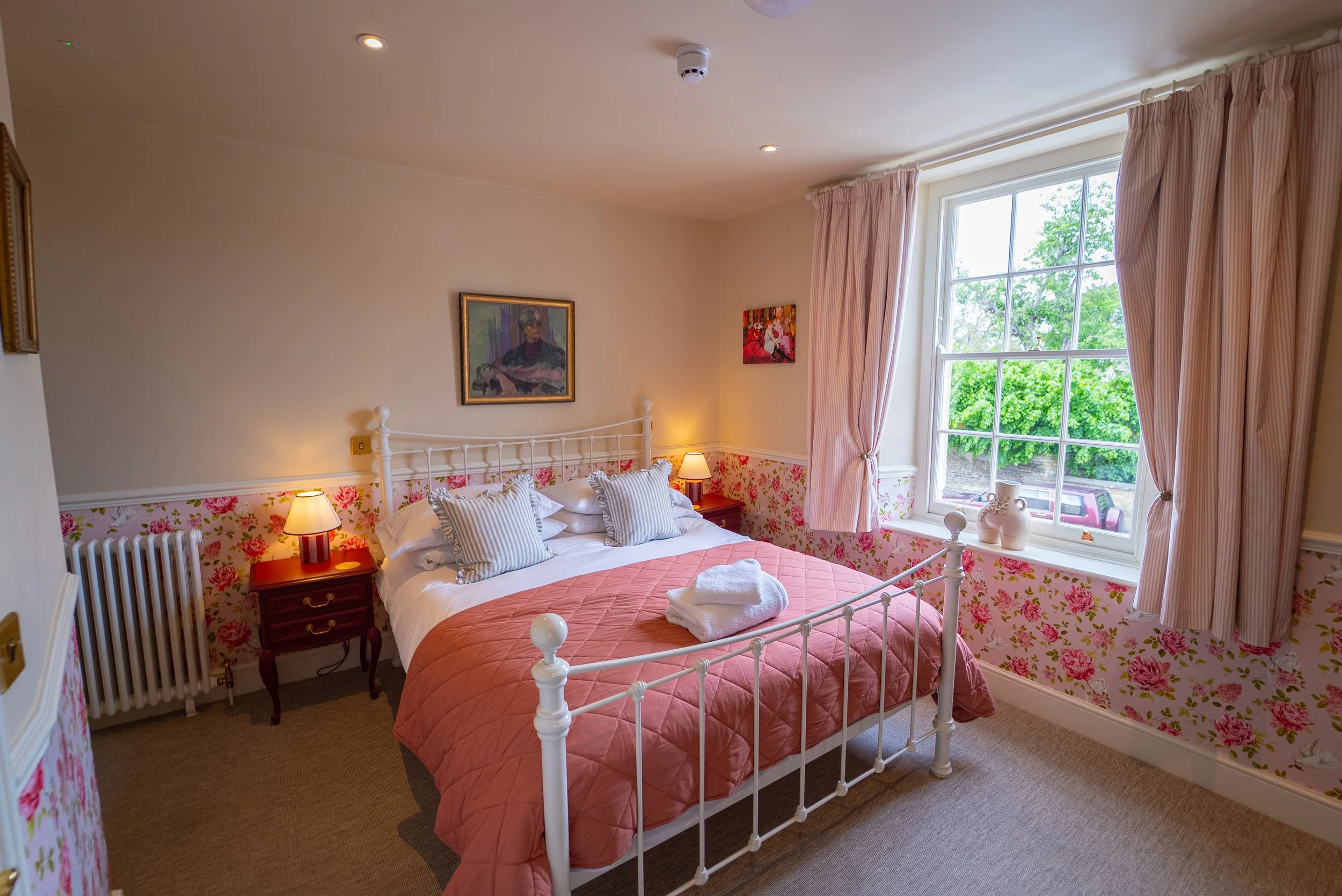 ROOM 3- DESCRIPTION: Room type= Standard Double Room. First floor, end of hall. Located at the front, village facing. King bed, walk-in shower.