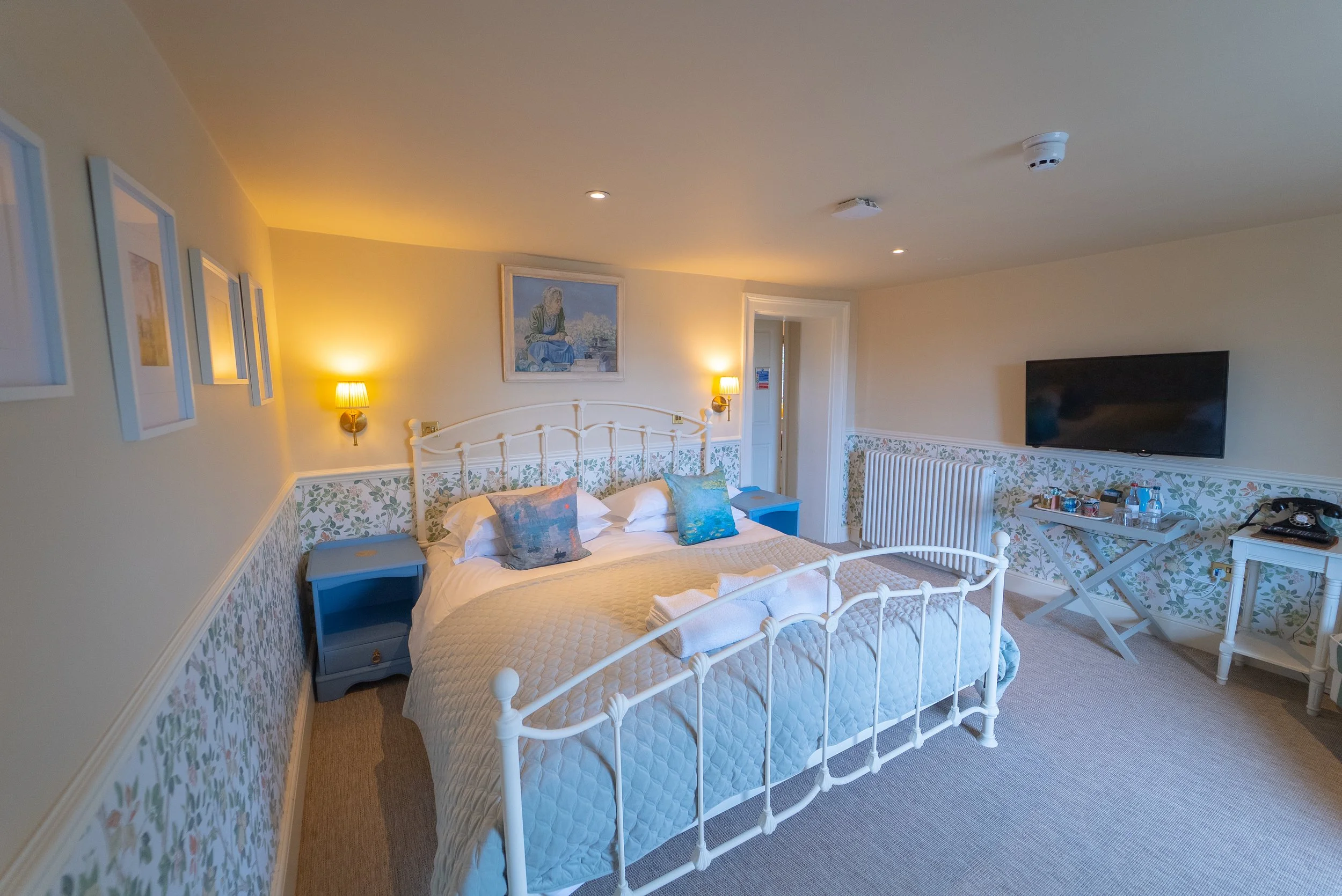 ROOM 8- DESCRIPTION: Room type= Deluxe Double with Bath. Super-king bed, and dressing area. Second floor. Located at the front and rear, village and garden facing. Huge ensuite with bath, double sinks and large walk-in shower. This room is 'Master Be