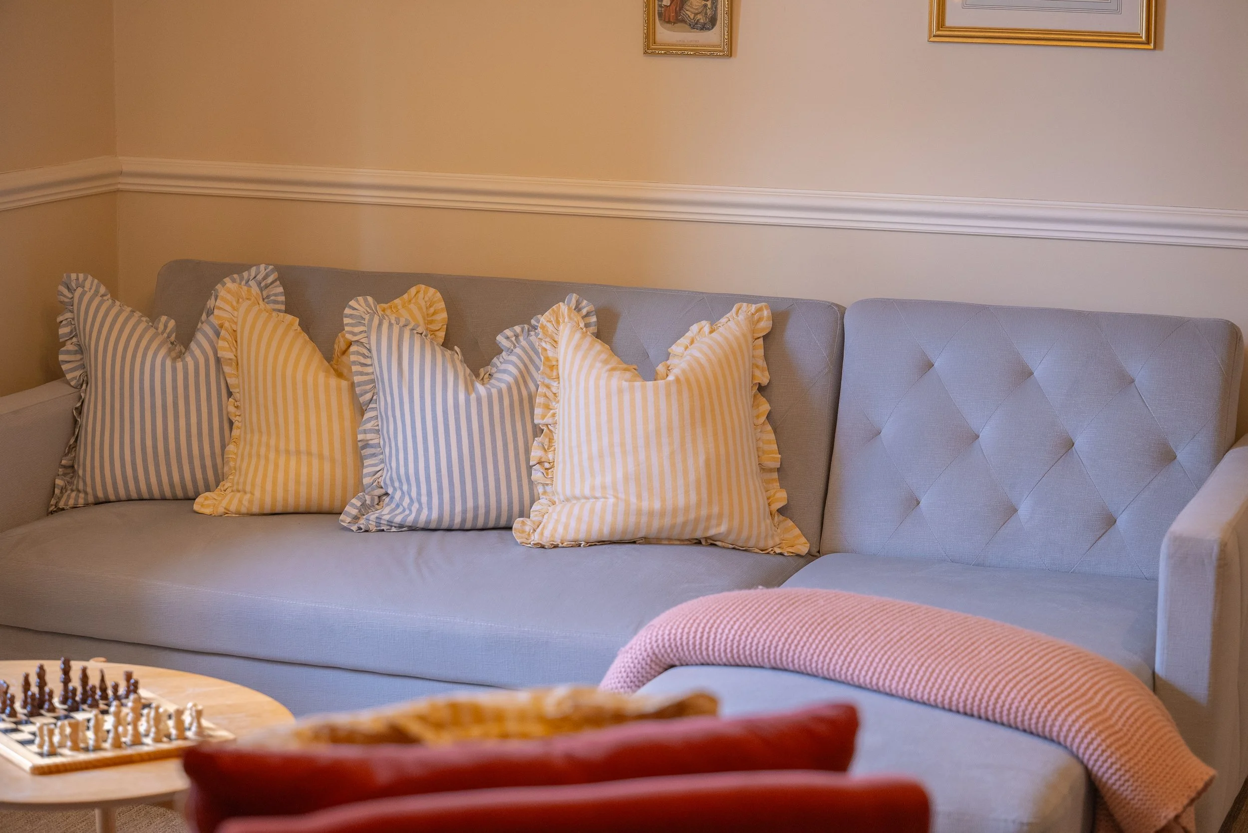 SOFA IN PRIVATE LOUNGE FOR SUITE BOOKINGS