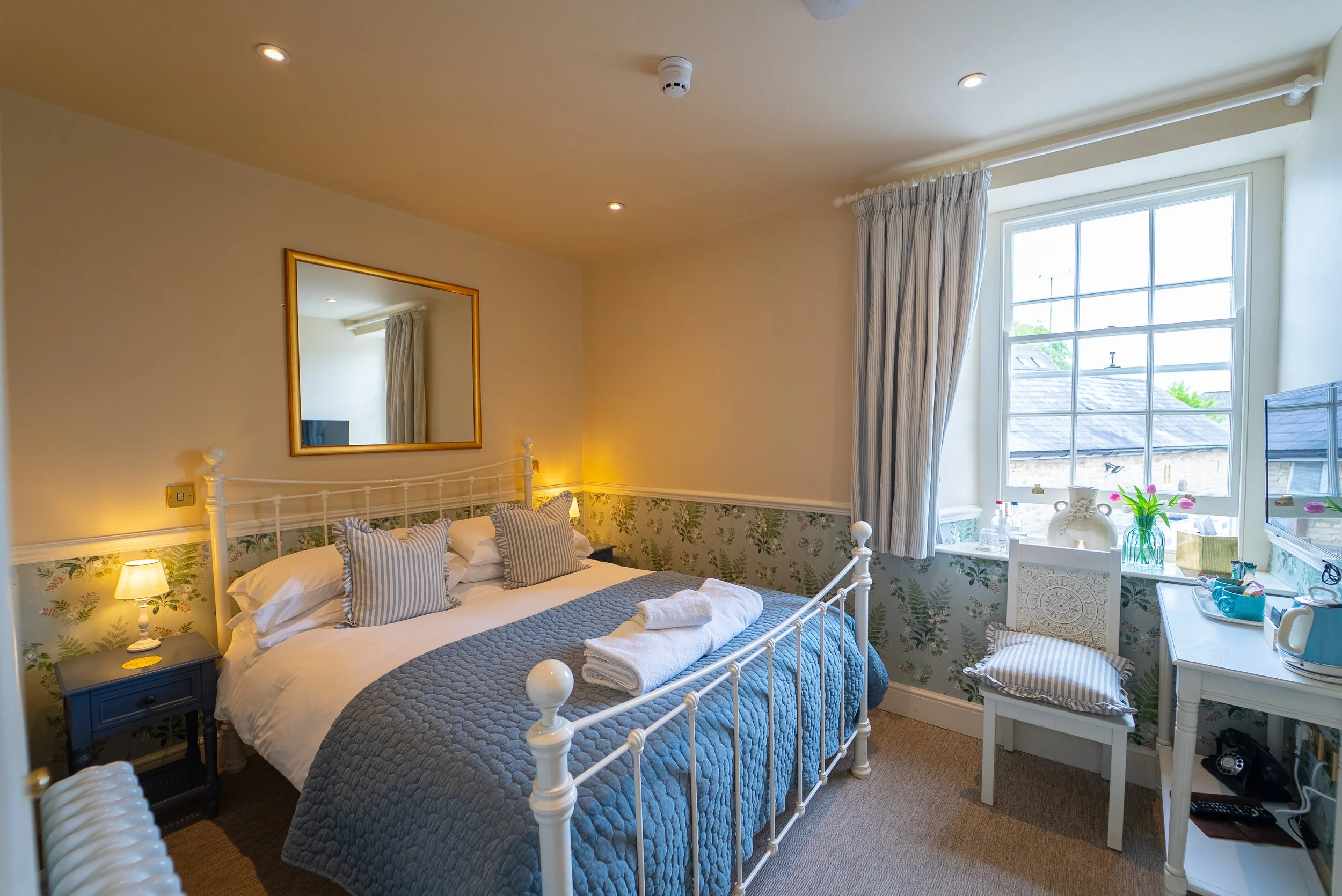 ROOM 5- DESCRIPTION: Room type= Small Double Room. Smallest double room. First floor. Located at the back, garden facing. King bed, walk-in shower.