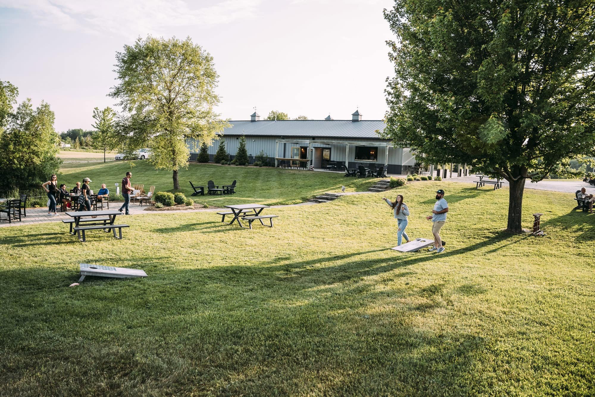 The Lawn. Open grass and vineyard views, the perfect setting for outdoor celebrations under the sky.