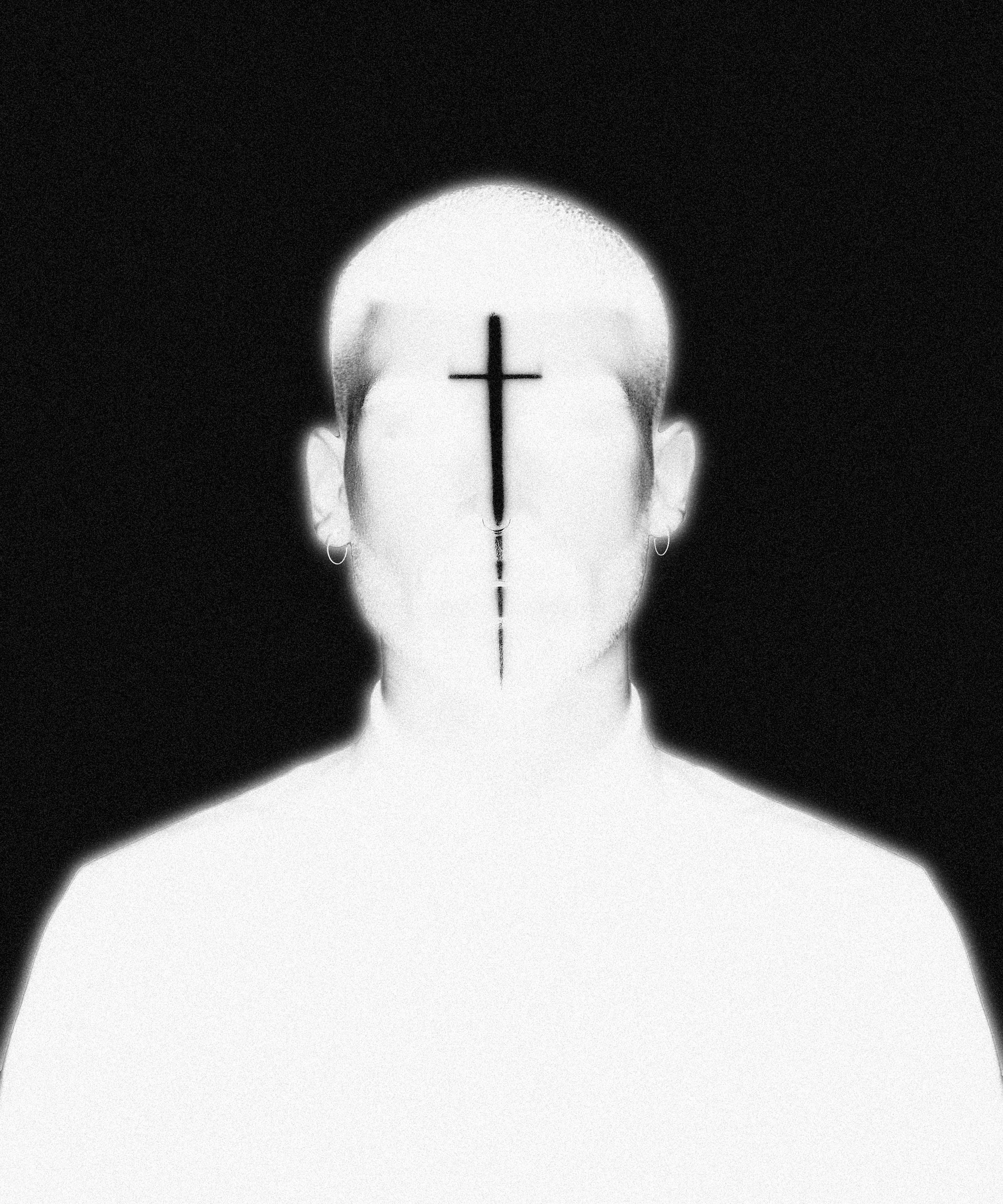 Music portrait in black and white: painted cross, shot from behind