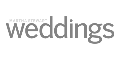 Martha Stewart Weddings logo in gray text on a black background