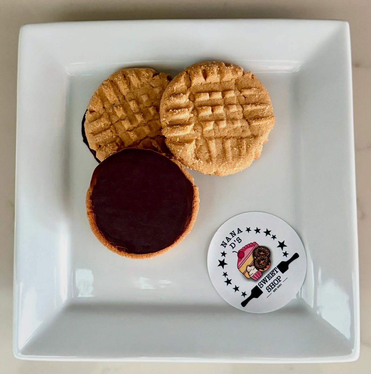 The perfect combo: delicious peanut butter cookies + rich chocolate dipped = pure magic.

Each bite melts in your mouth with sweet, salty, chocolatey goodness. 

Trust us, one won&rsquo;t be enough.