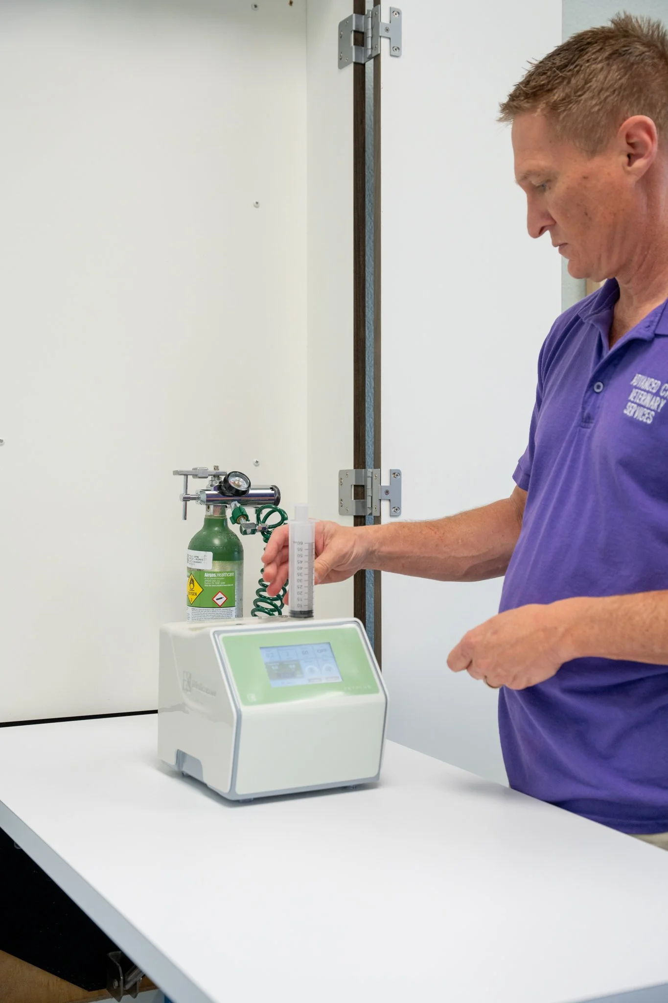 Veterinary ozone therapy equipment in use by Dr. Stramel for dogs , cats & horses in Carrollton, TX