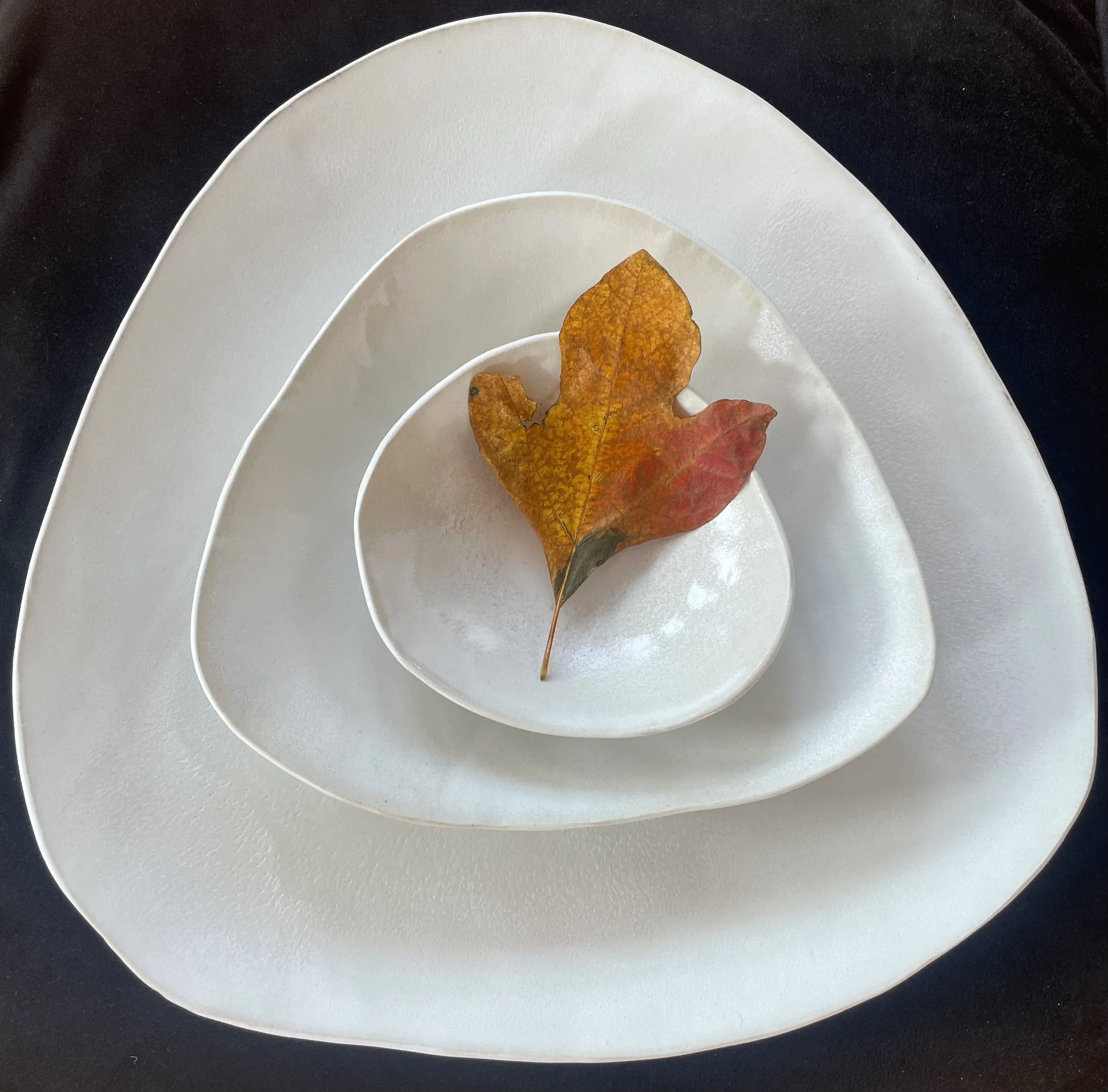 set of 3, lg. base 18 in. x 19 in.