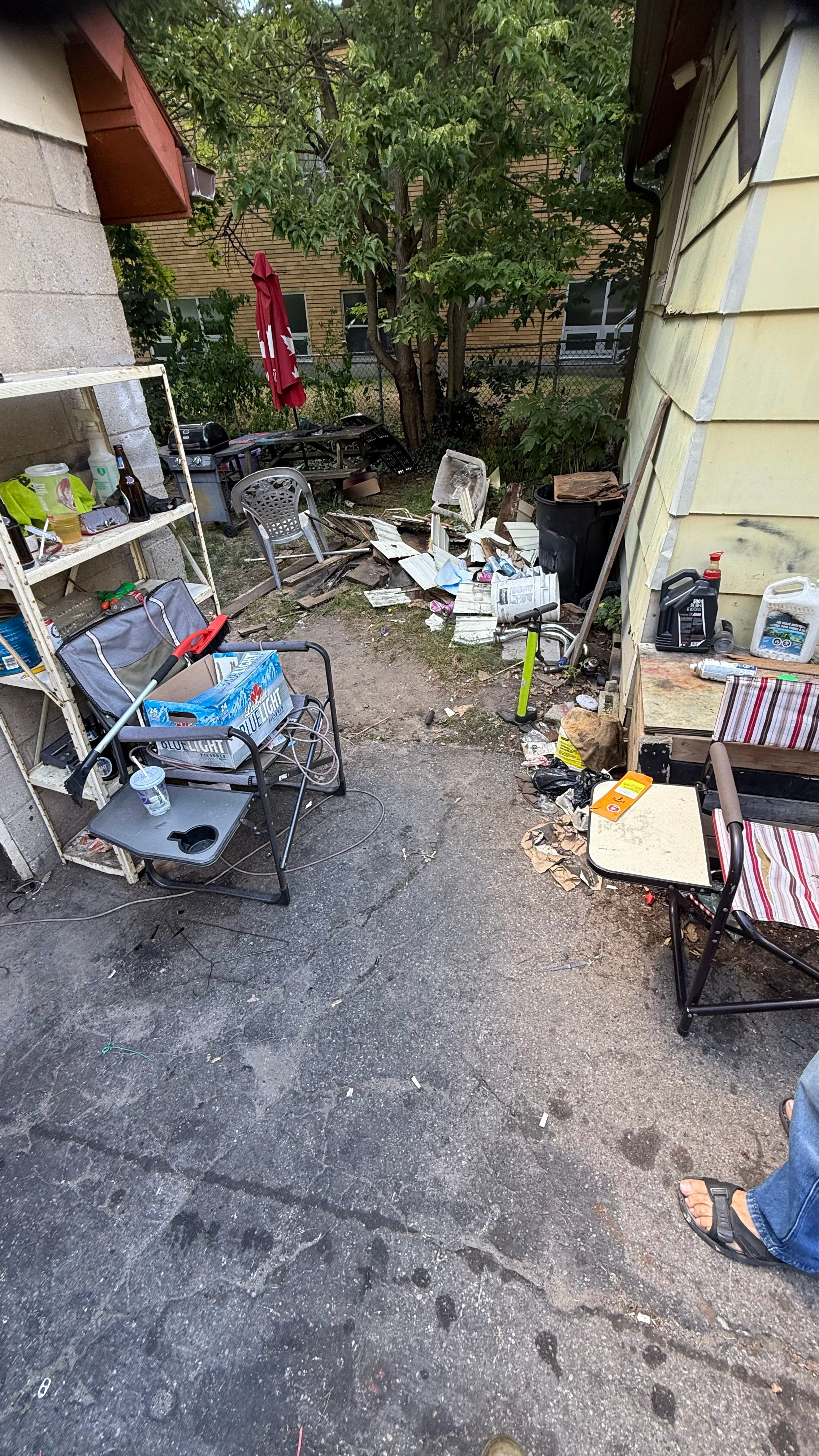 hoarding cleanup landlord London Ontario junk ranger clearing rental unit after hoarding situation discreetly