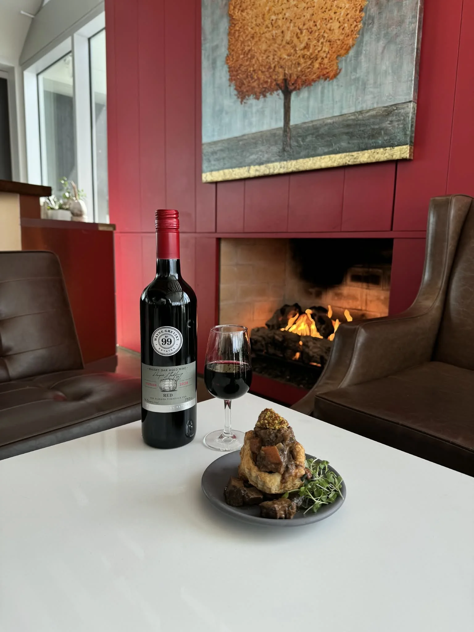 Steak and mushroom vol-au-vent and a glass of Wayne Gretzky Estates red wine