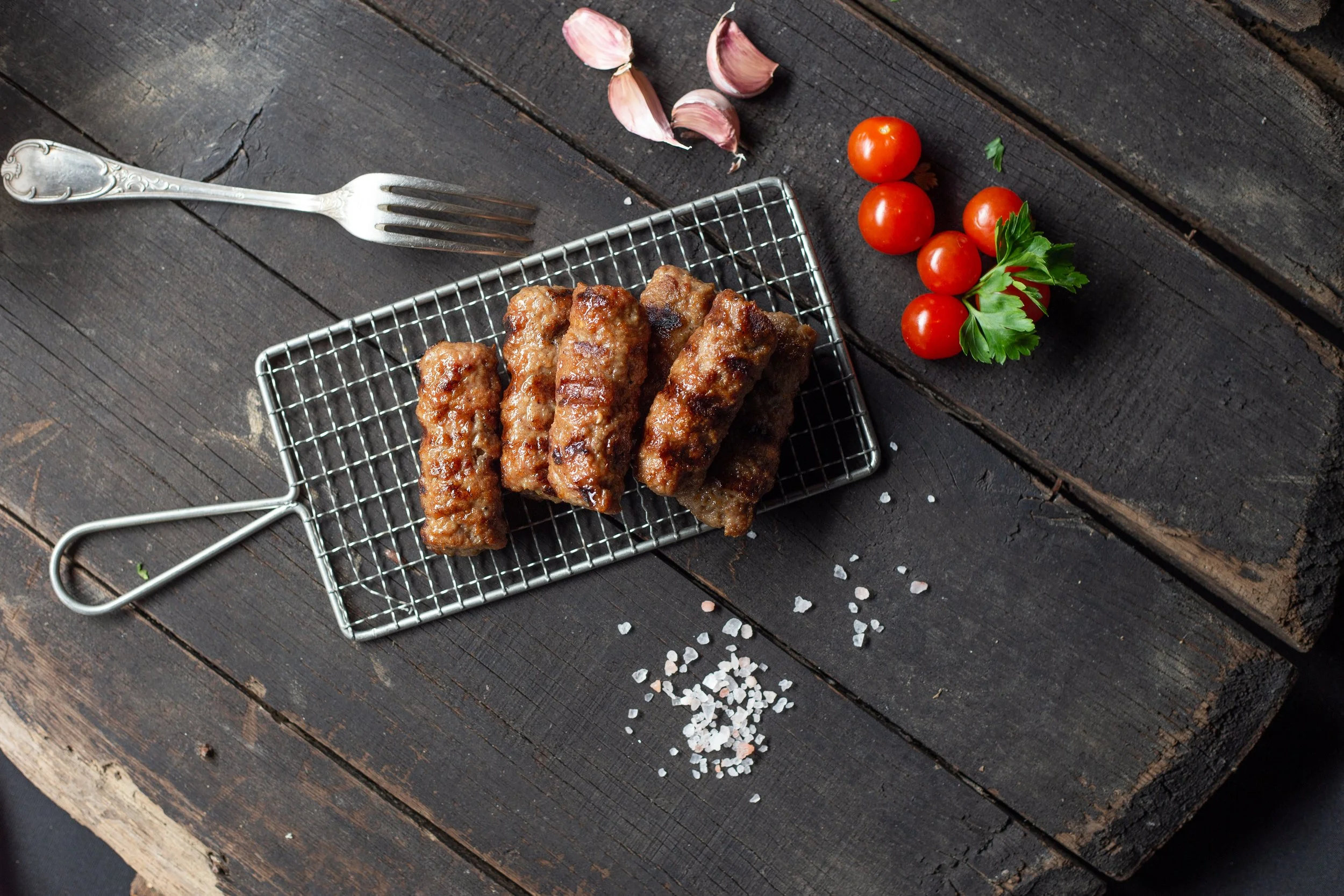 Traditional grilled sausages with adjika