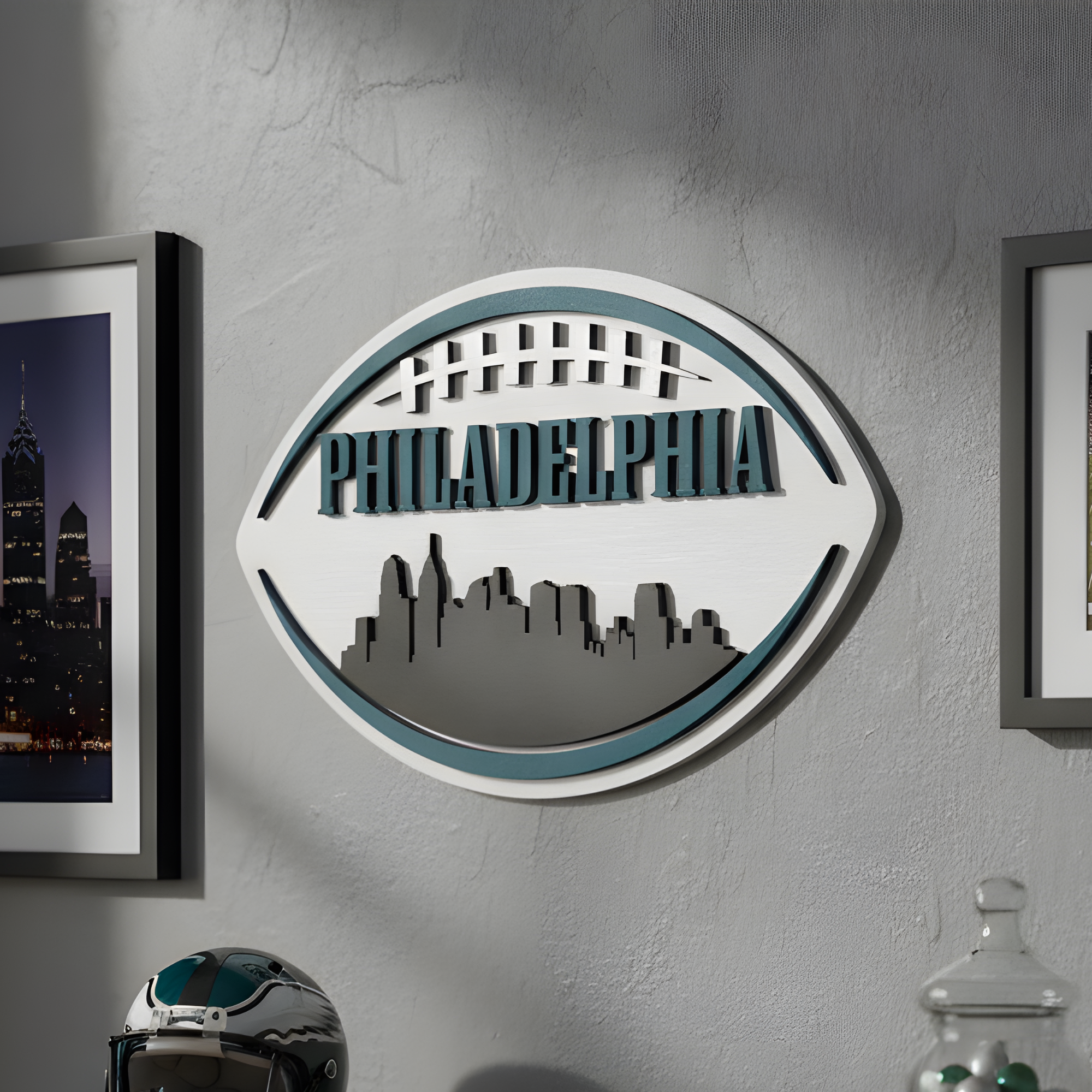 Philadelphia 3D football skyline sign above a desk with Eagles memorabilia.