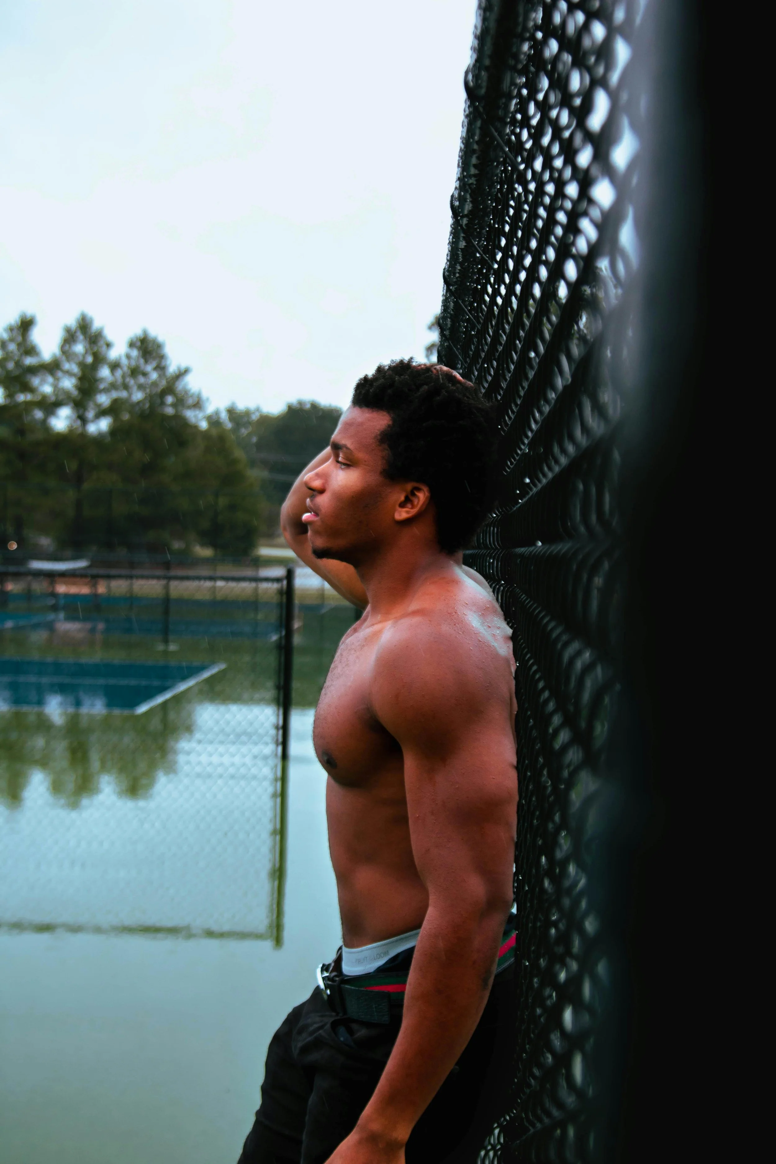 A lean, muscular, young black man