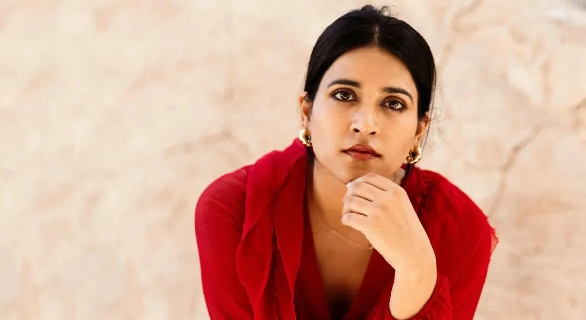 Young indian woman with beautiful skin illustrating result of biostimulant treatments