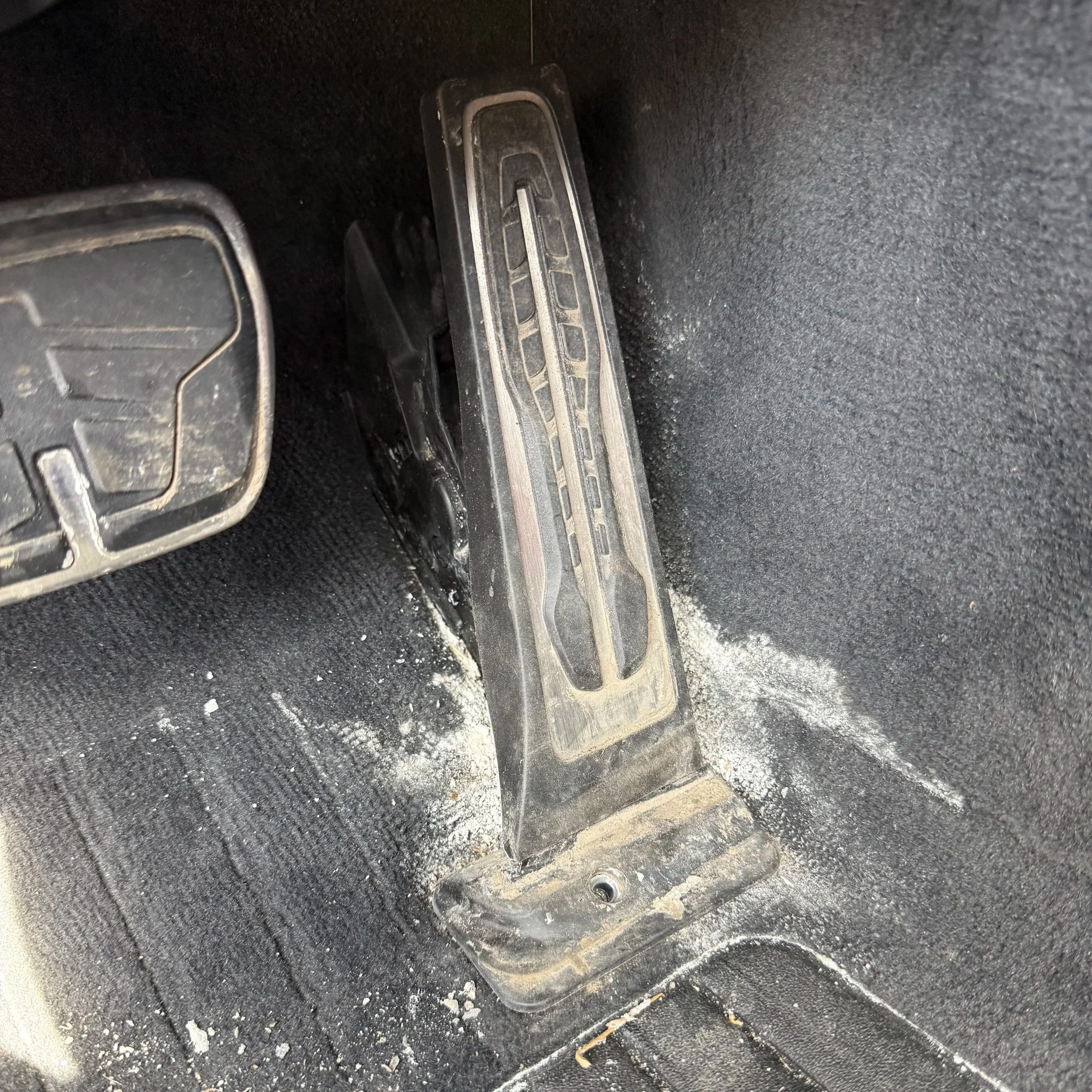 Close-up of a vehicle's accelerator pedal.