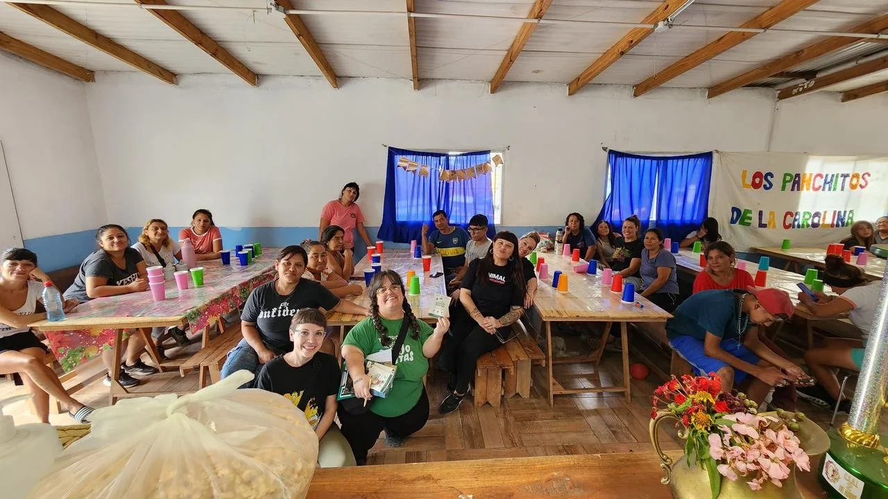 People sitting together smiling in classroom