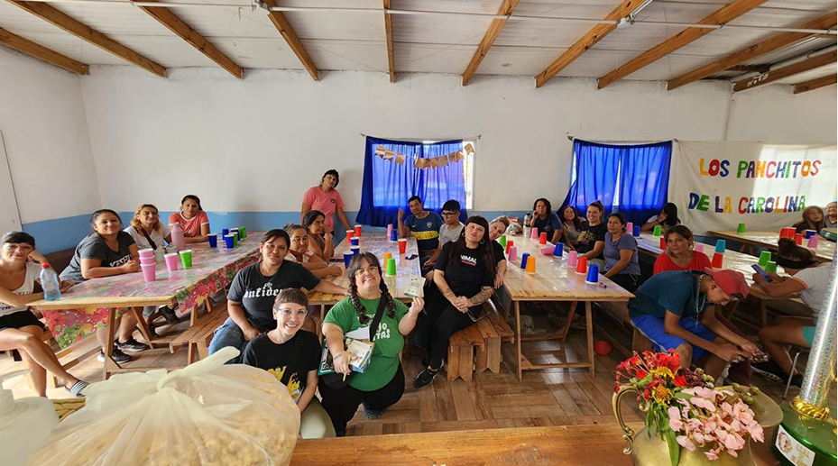 People sitting in classroom smiling