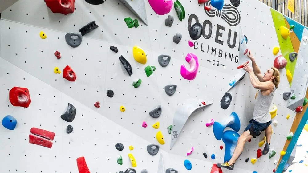 climber on wall at coeur climbing post falls