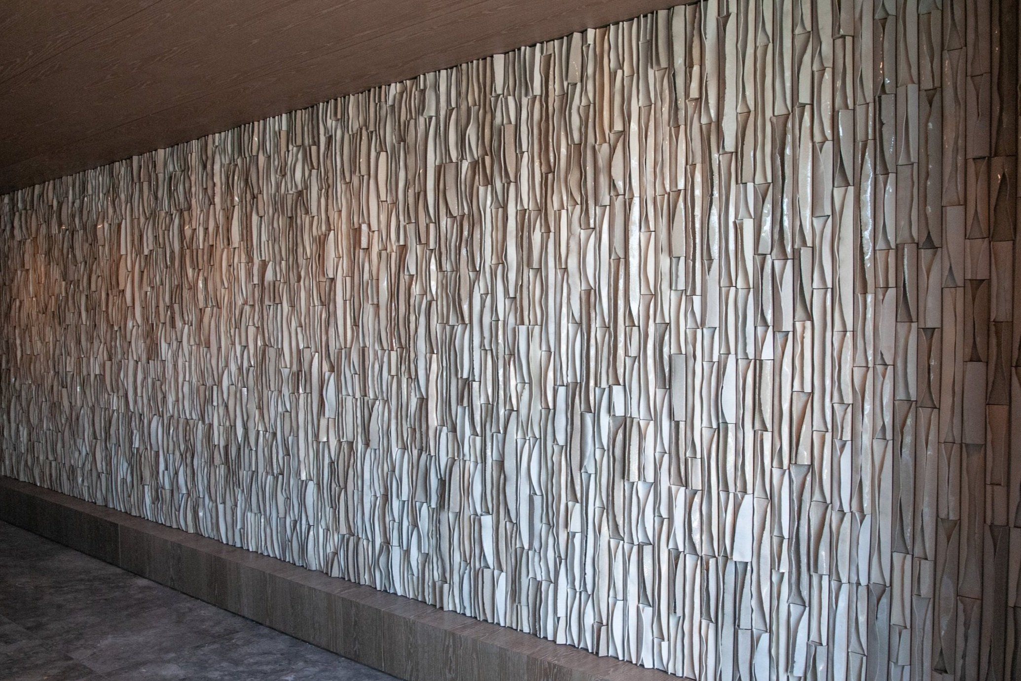 Ben-Medansky-ceramic-waves-wall-installation-ConradGrandHotel.jpg