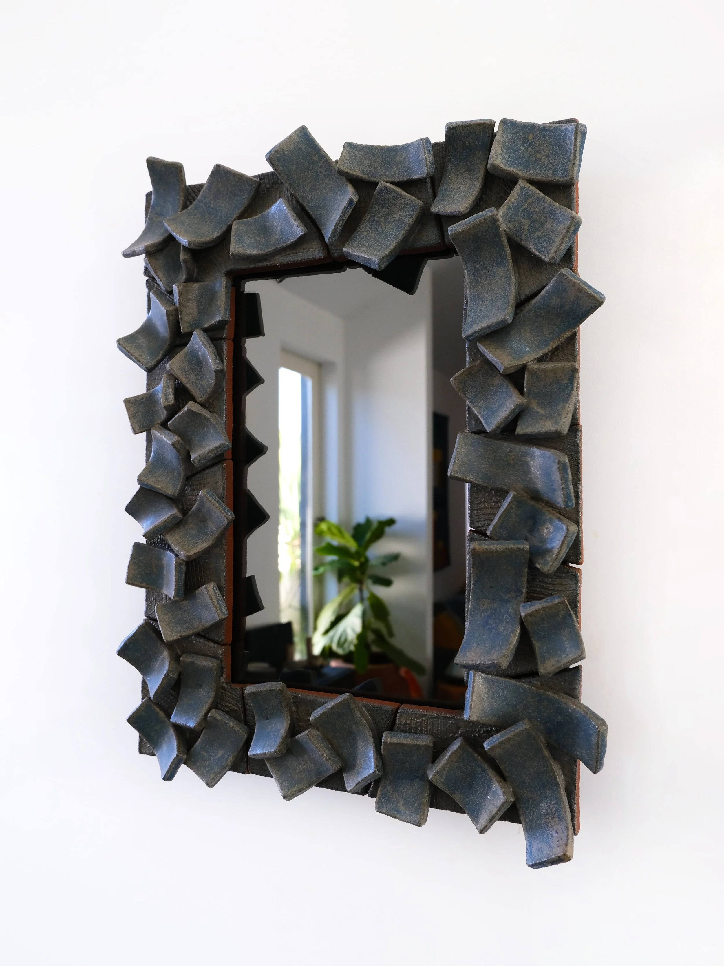 Ben-Medansky-black-ceramic-mirror.jpg