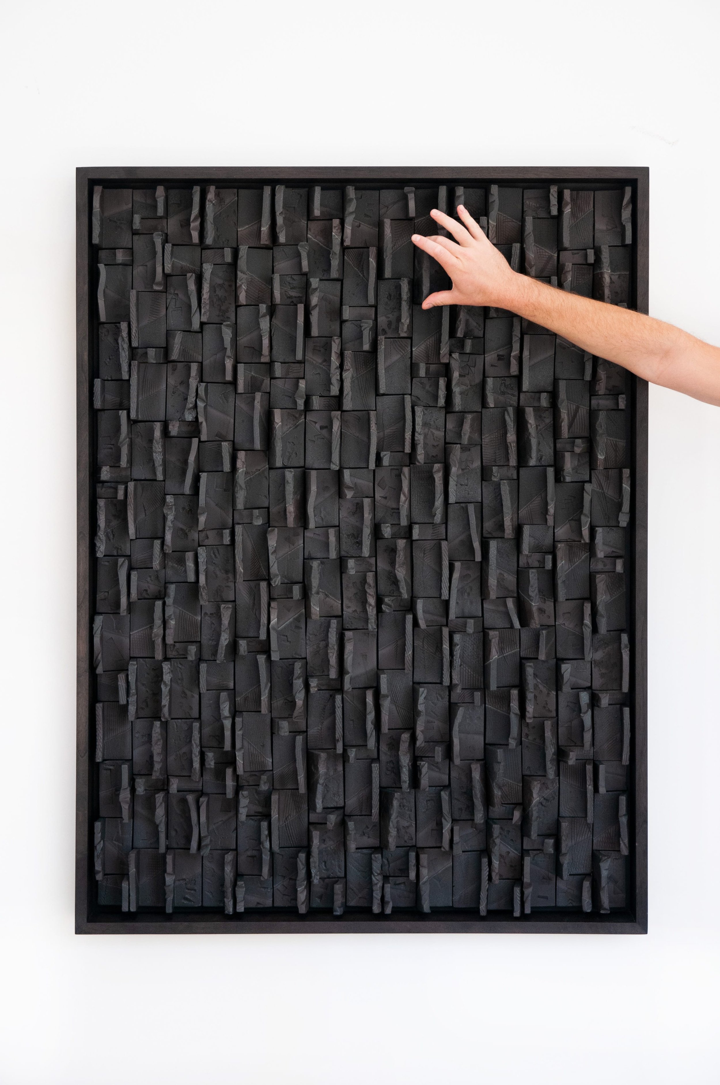 Ben-Medansky-black-ceramic-art-hand.jpg