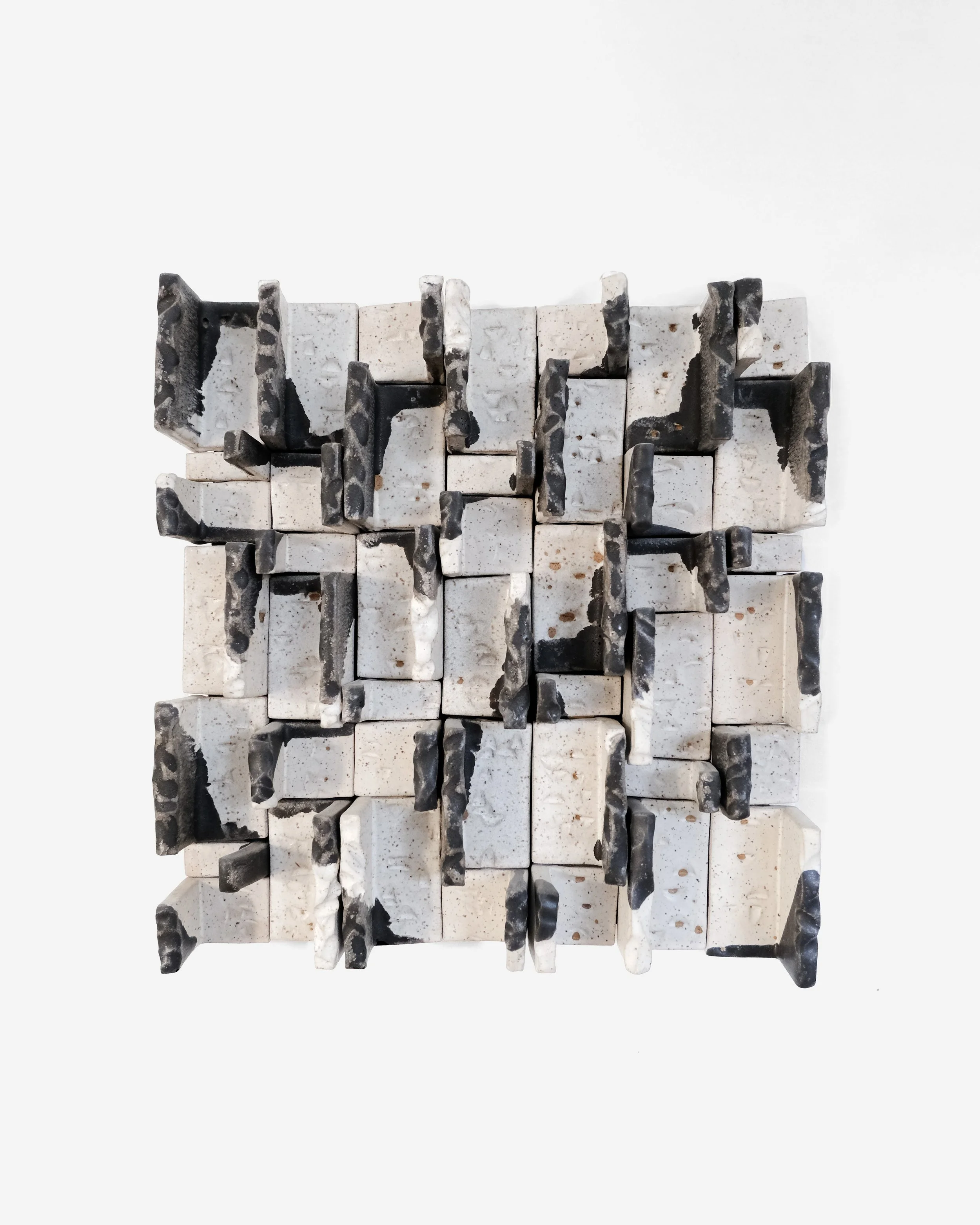 Ben-Medansky-black-white-ceramic-wall-art.jpg